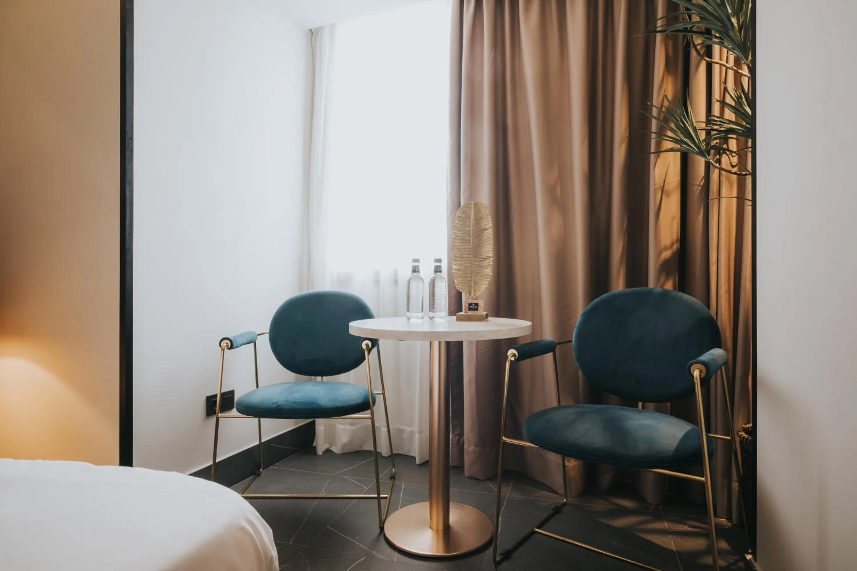 Seating area, Bed in Poem Suites, Las Canteras