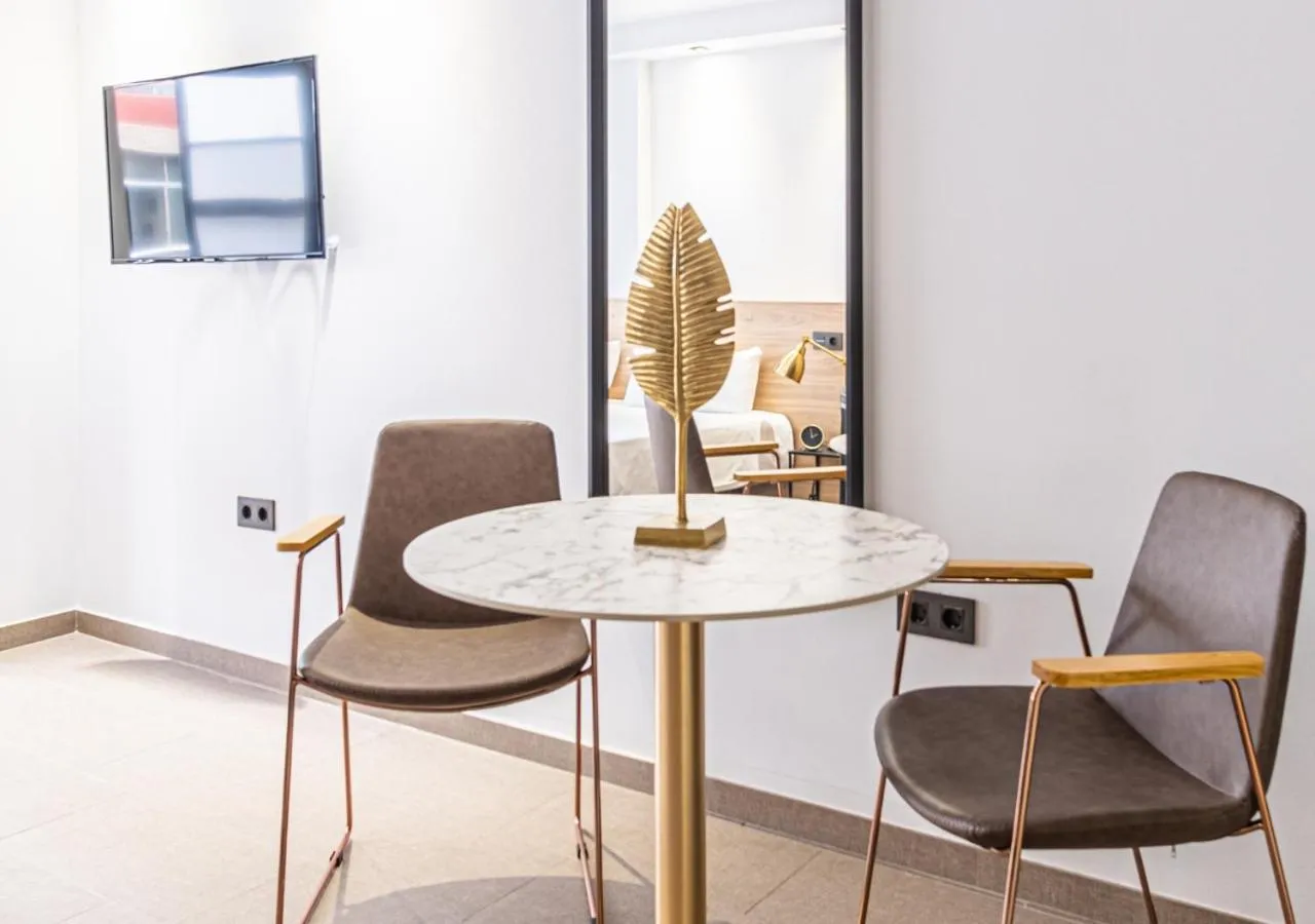 Seating area in Poem Suites, Las Canteras