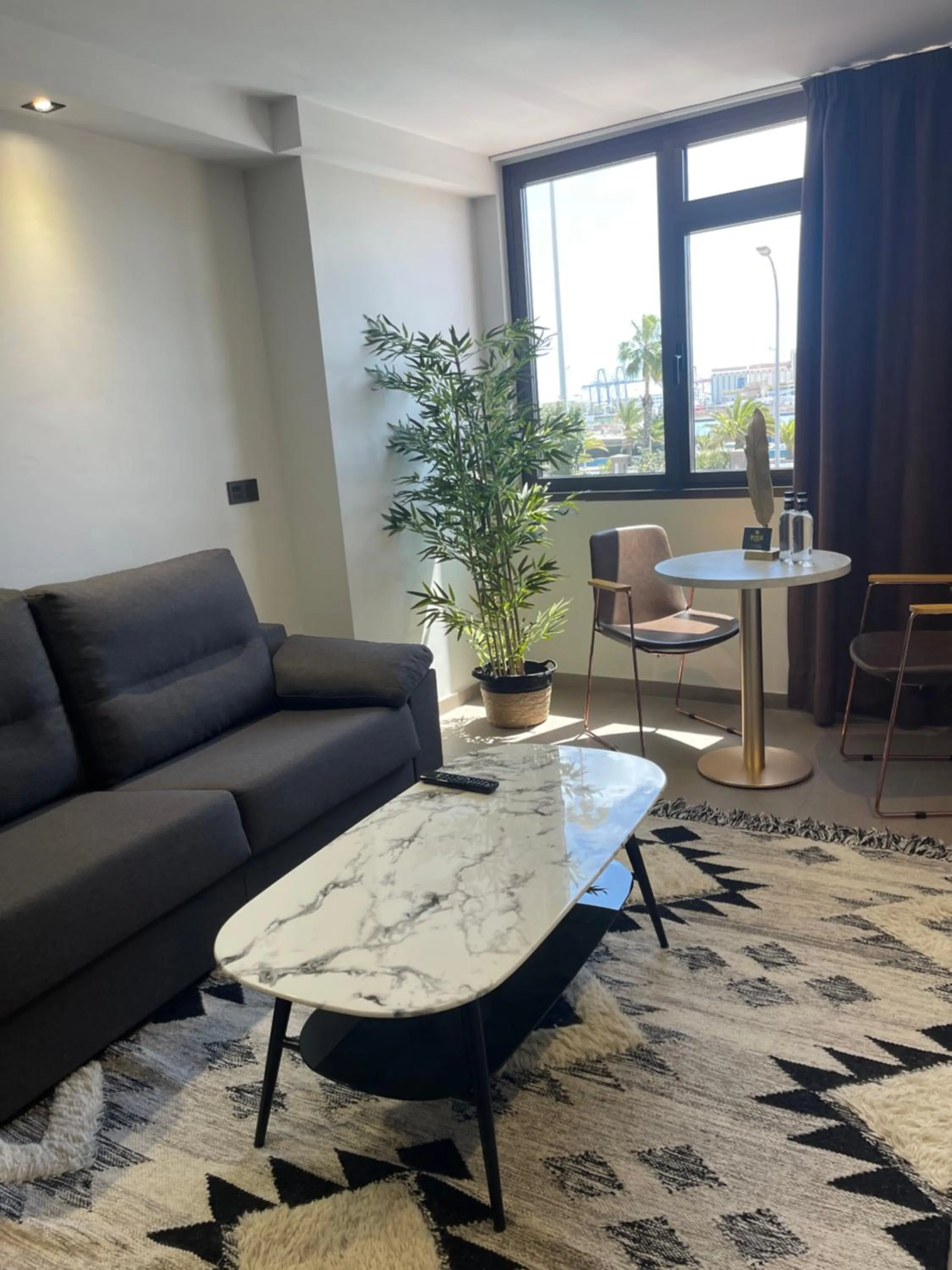 Living room in Poem Suites, Las Canteras