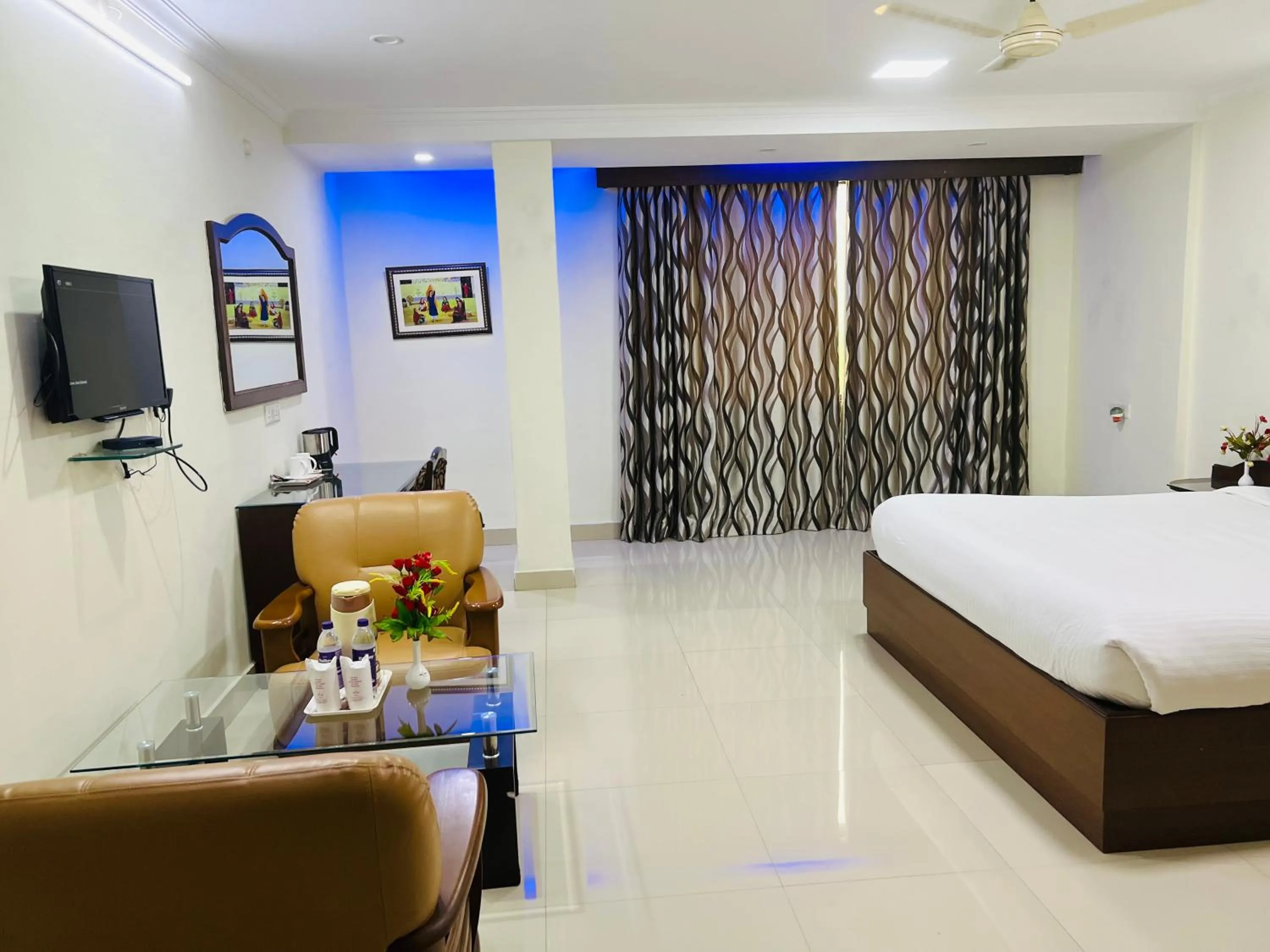 Photo of the whole room, Bed in Bodhgaya Regency Hotel