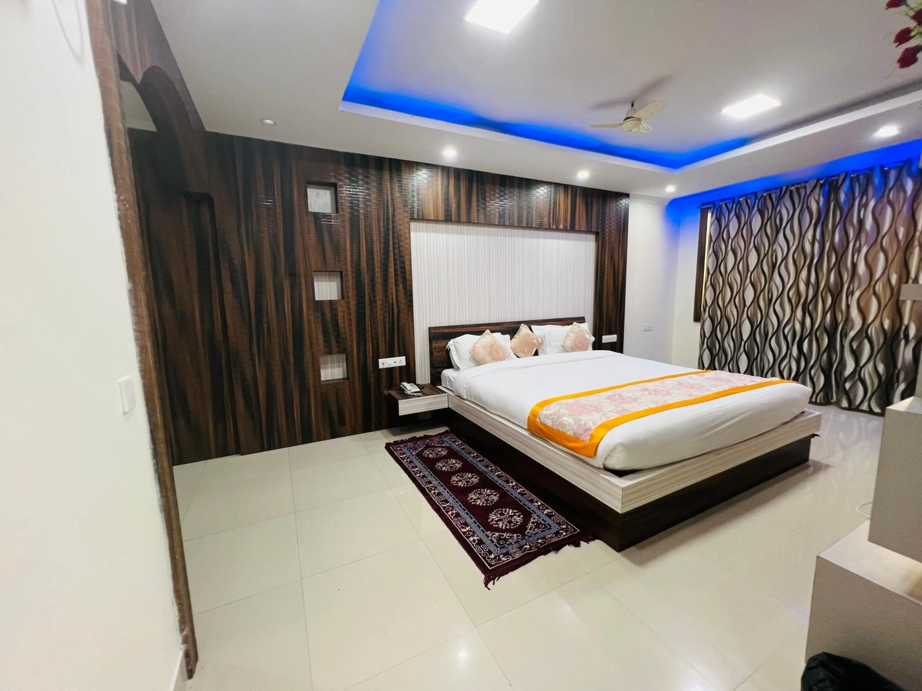 Photo of the whole room, Bed in Bodhgaya Regency Hotel