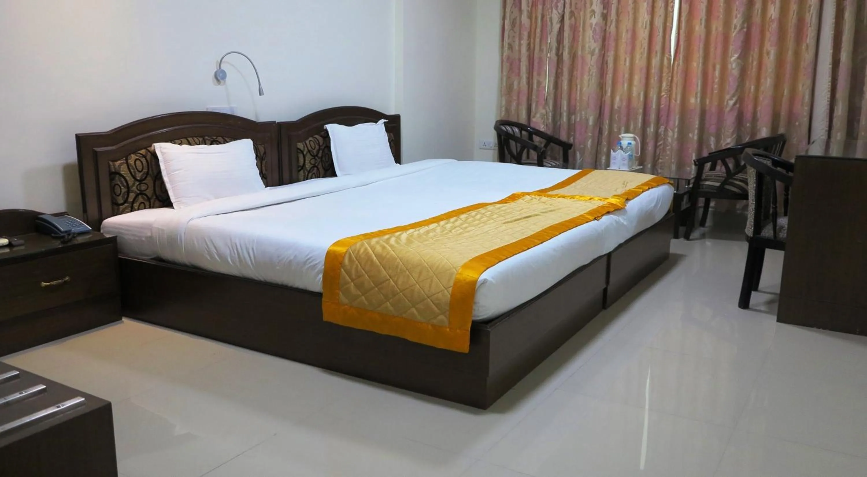 Bed in Bodhgaya Regency Hotel