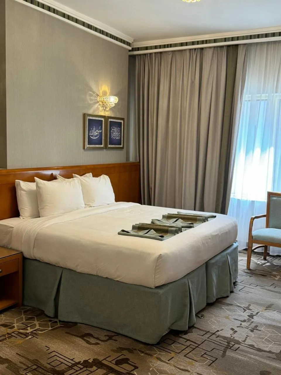 Bed in Emaar Grand Hotel