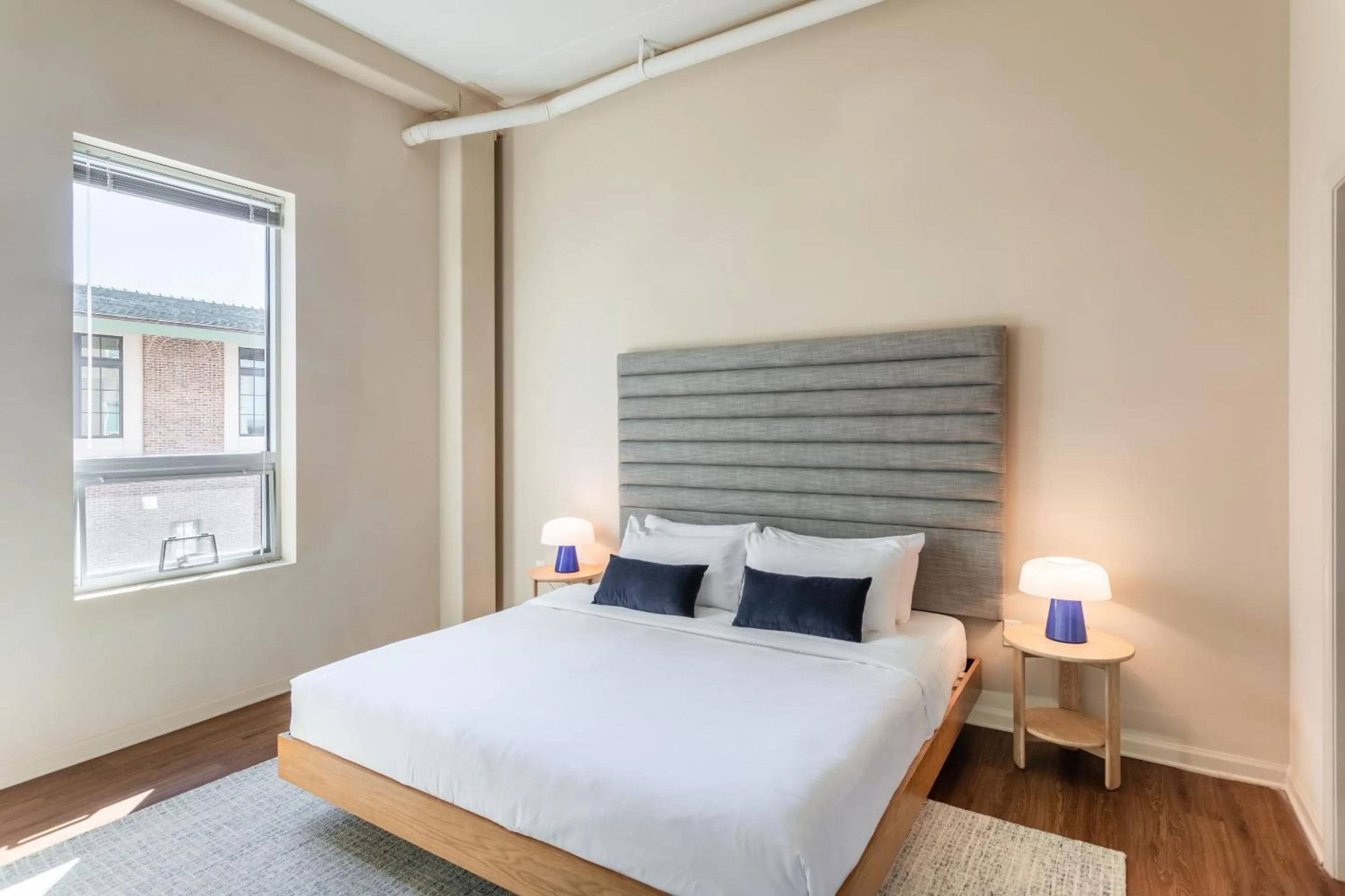 Bed in Mint House Greenville Downtown By Kasa