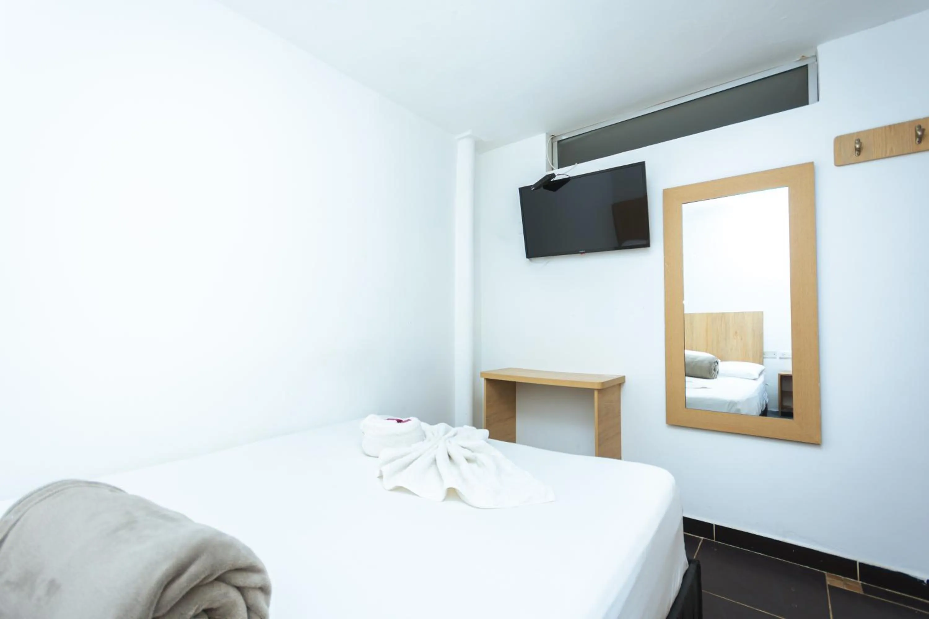 Bed in Hotel Colores Boutique