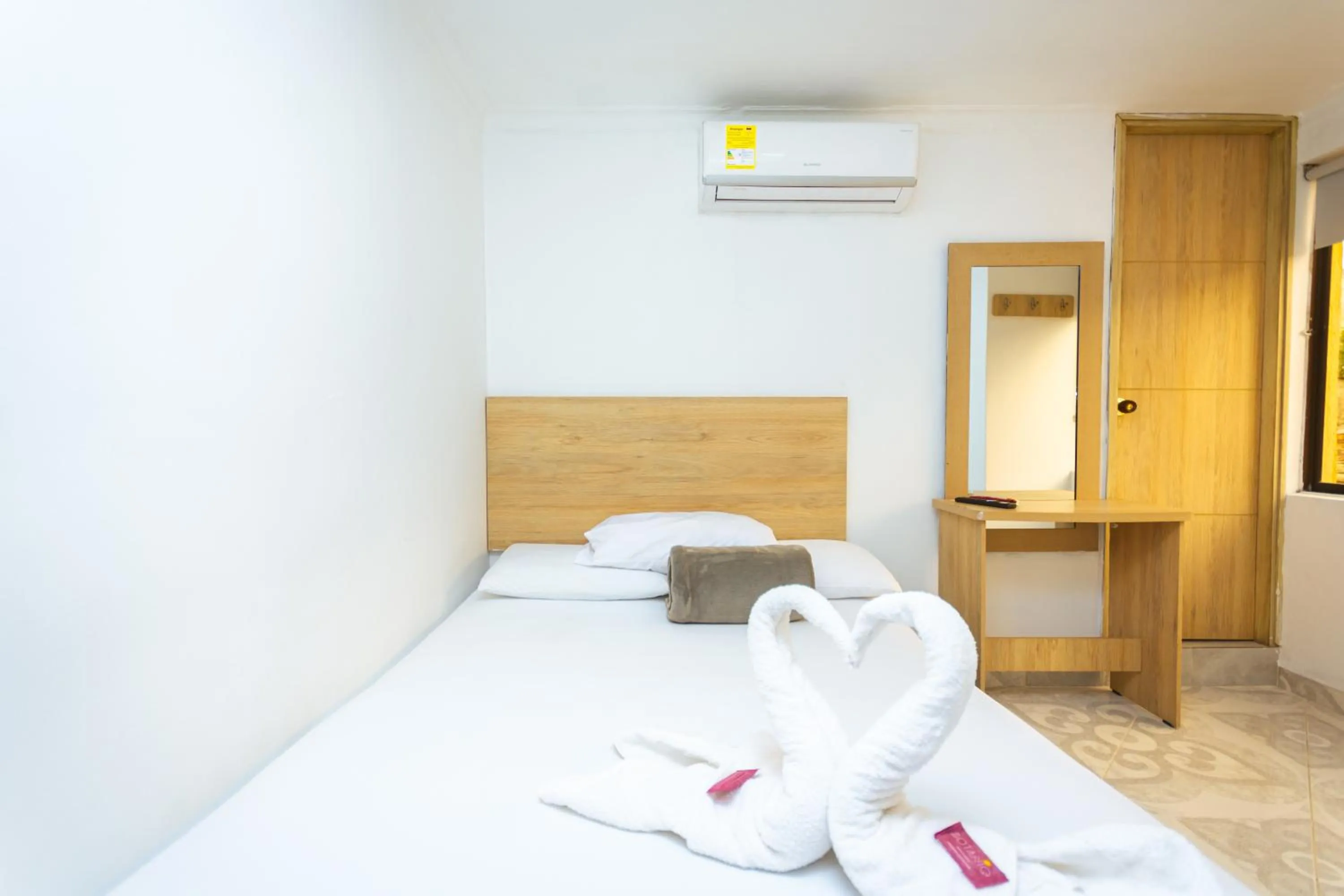 Bed in Hotel Colores Boutique