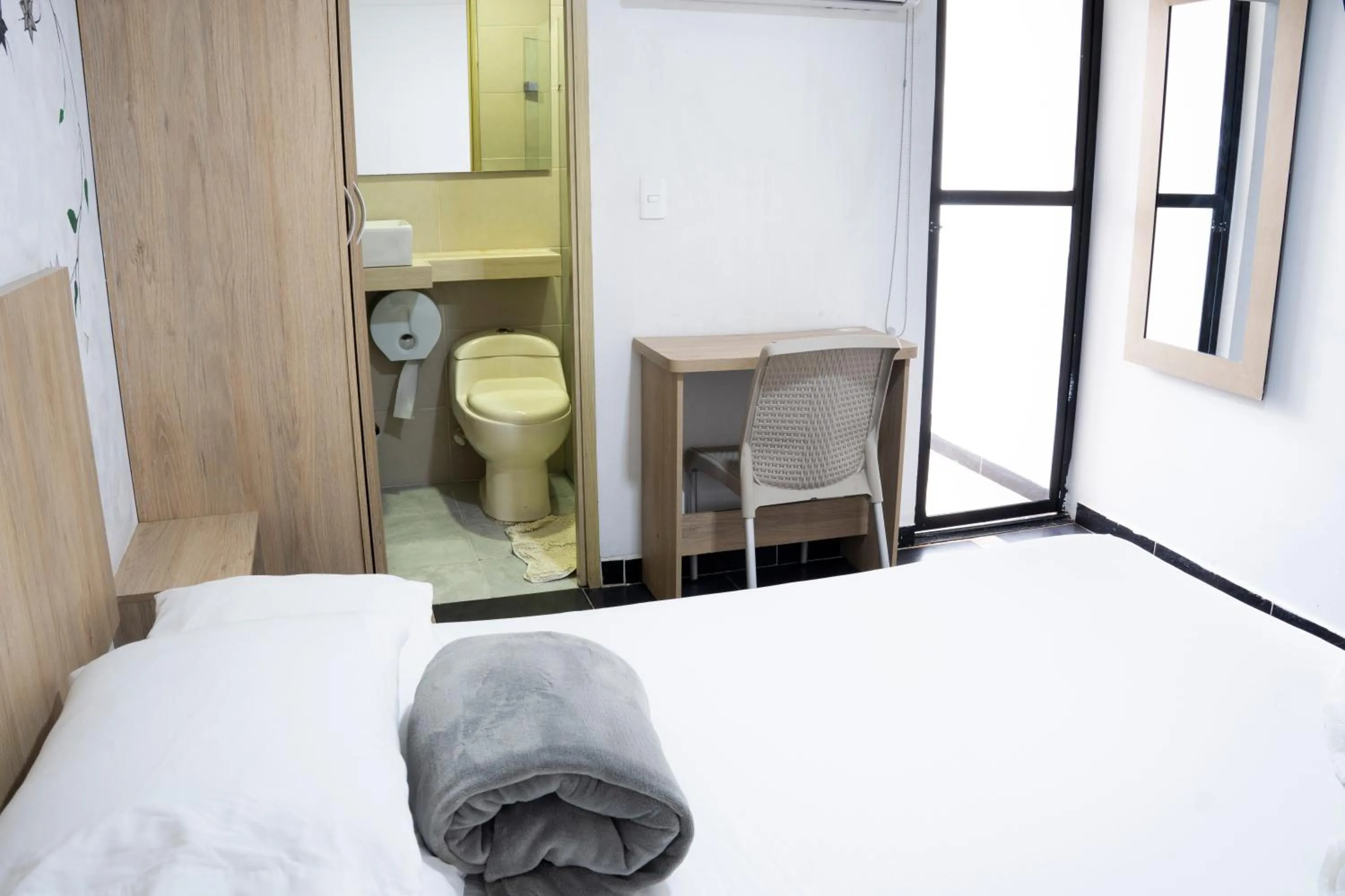 Bed in Hotel Colores Boutique