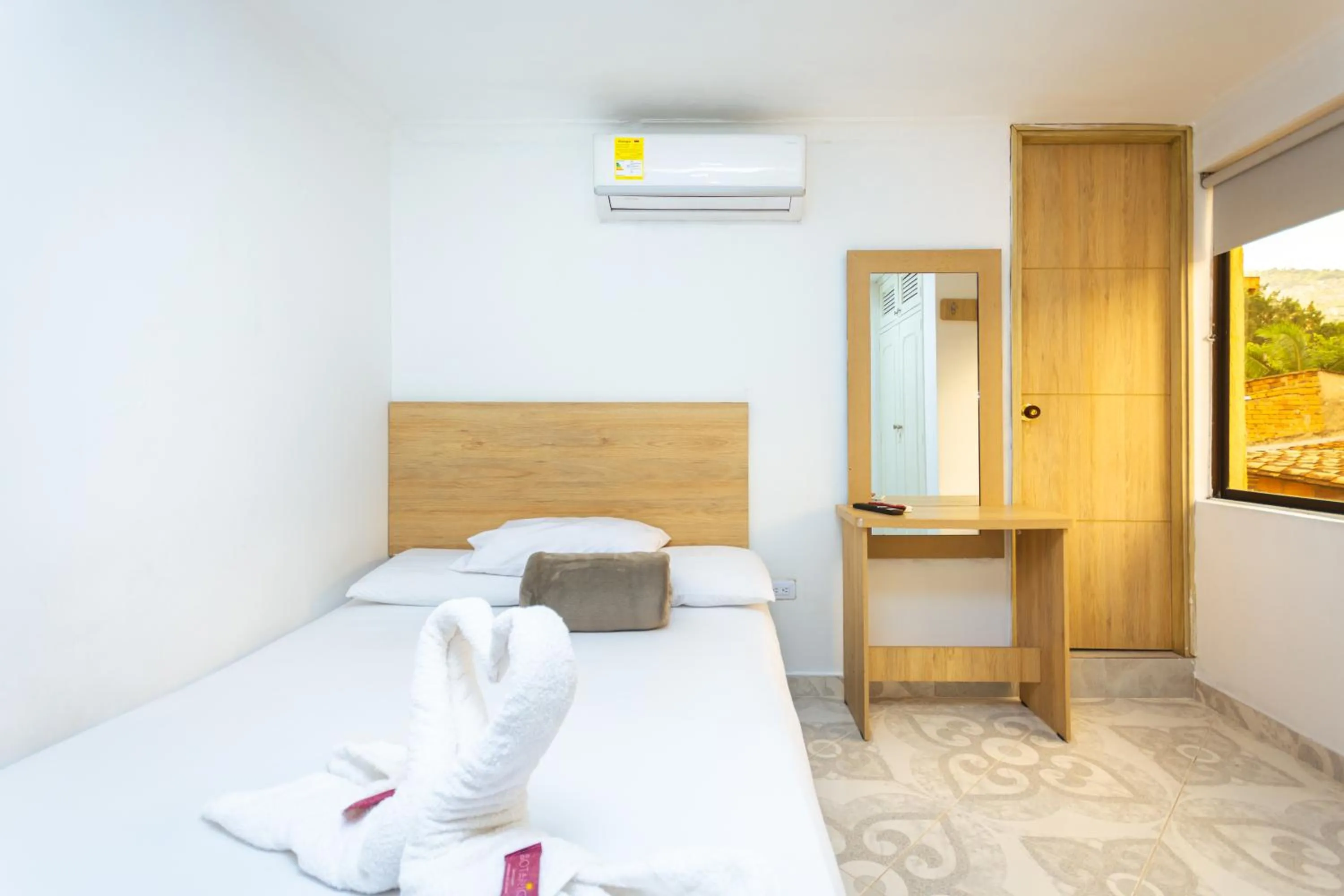 Bed in Hotel Colores Boutique