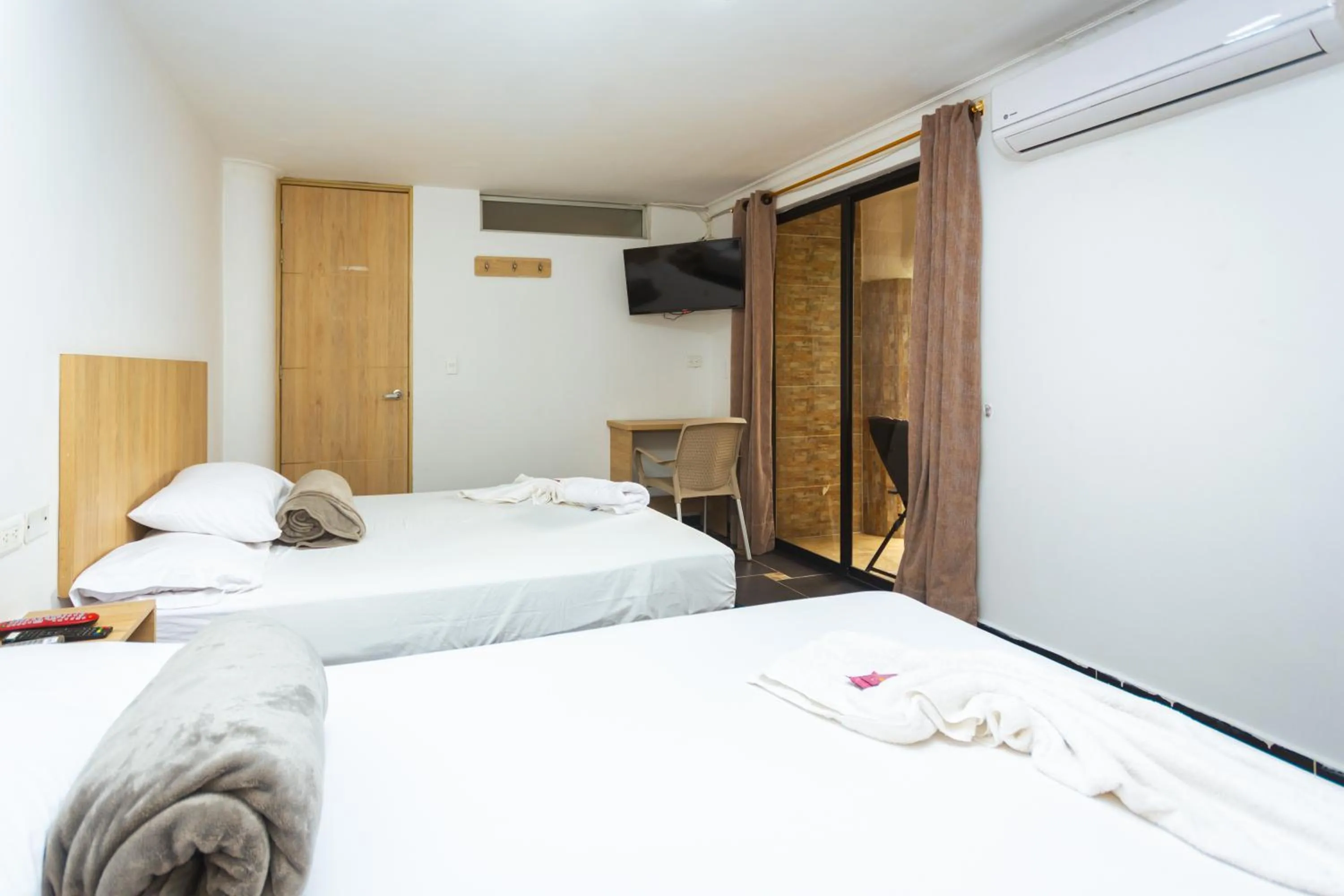 Bed in Hotel Colores Boutique