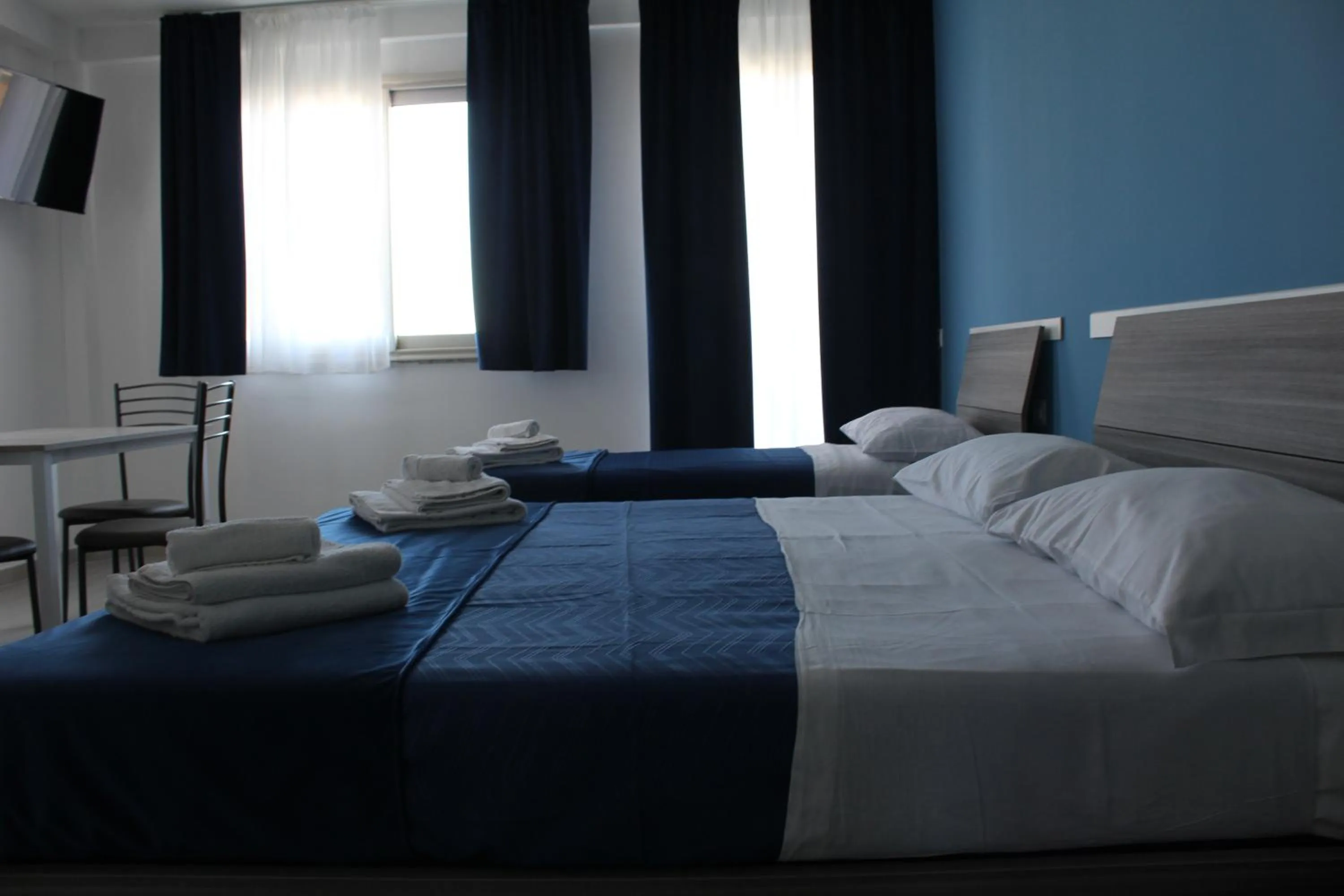 Bed in Naxos Laguna Beach