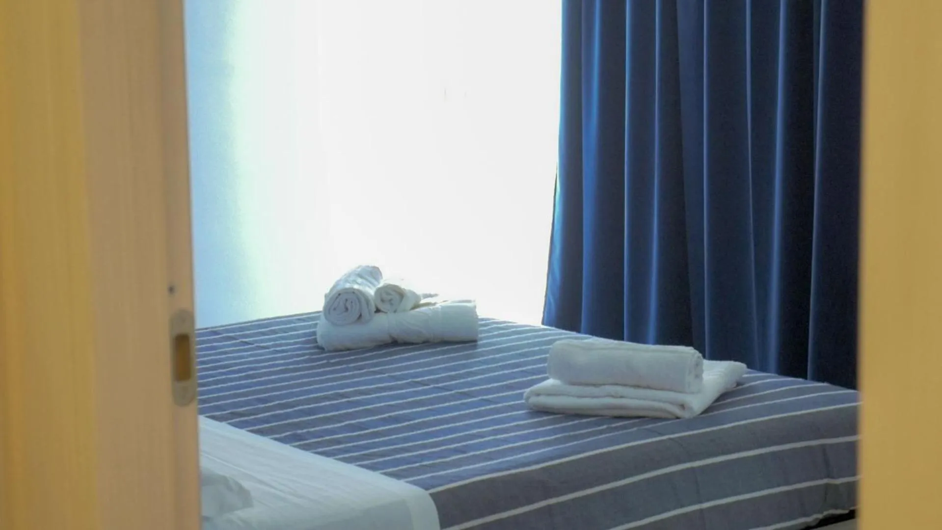 Bed in Naxos Laguna Beach