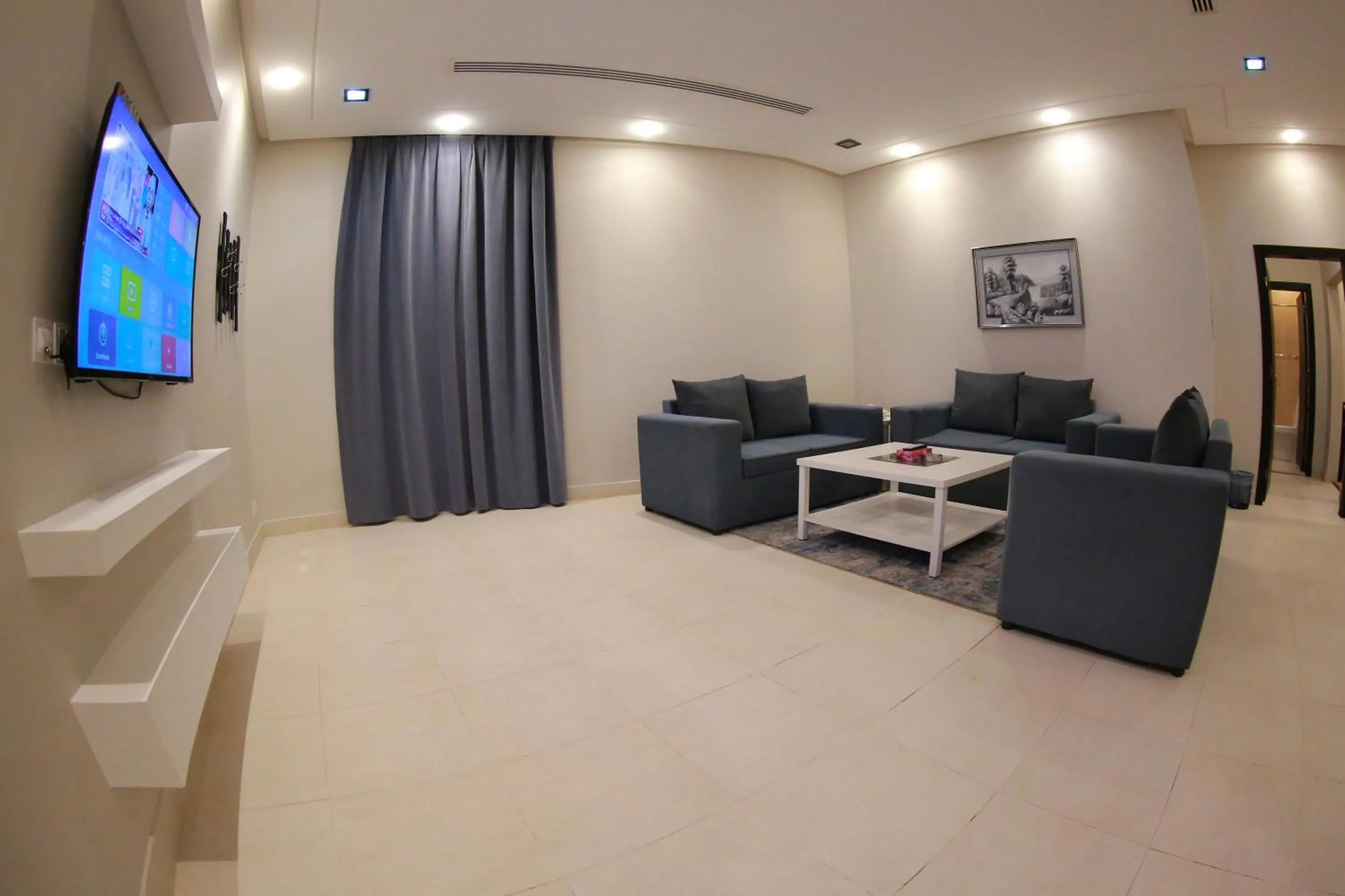 TV and multimedia in Rahty Home Hotel Apartments