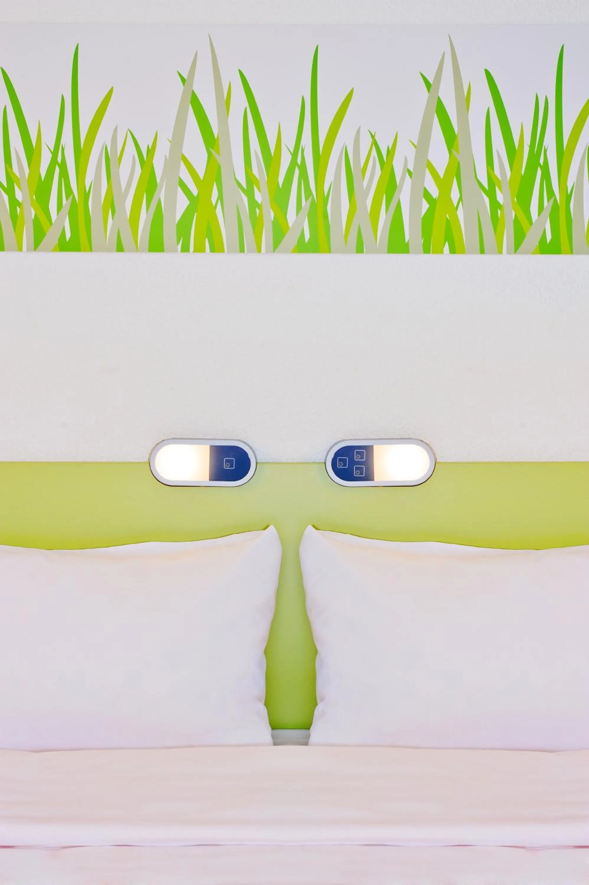 Bedroom in ibis Budget Caen Memorial