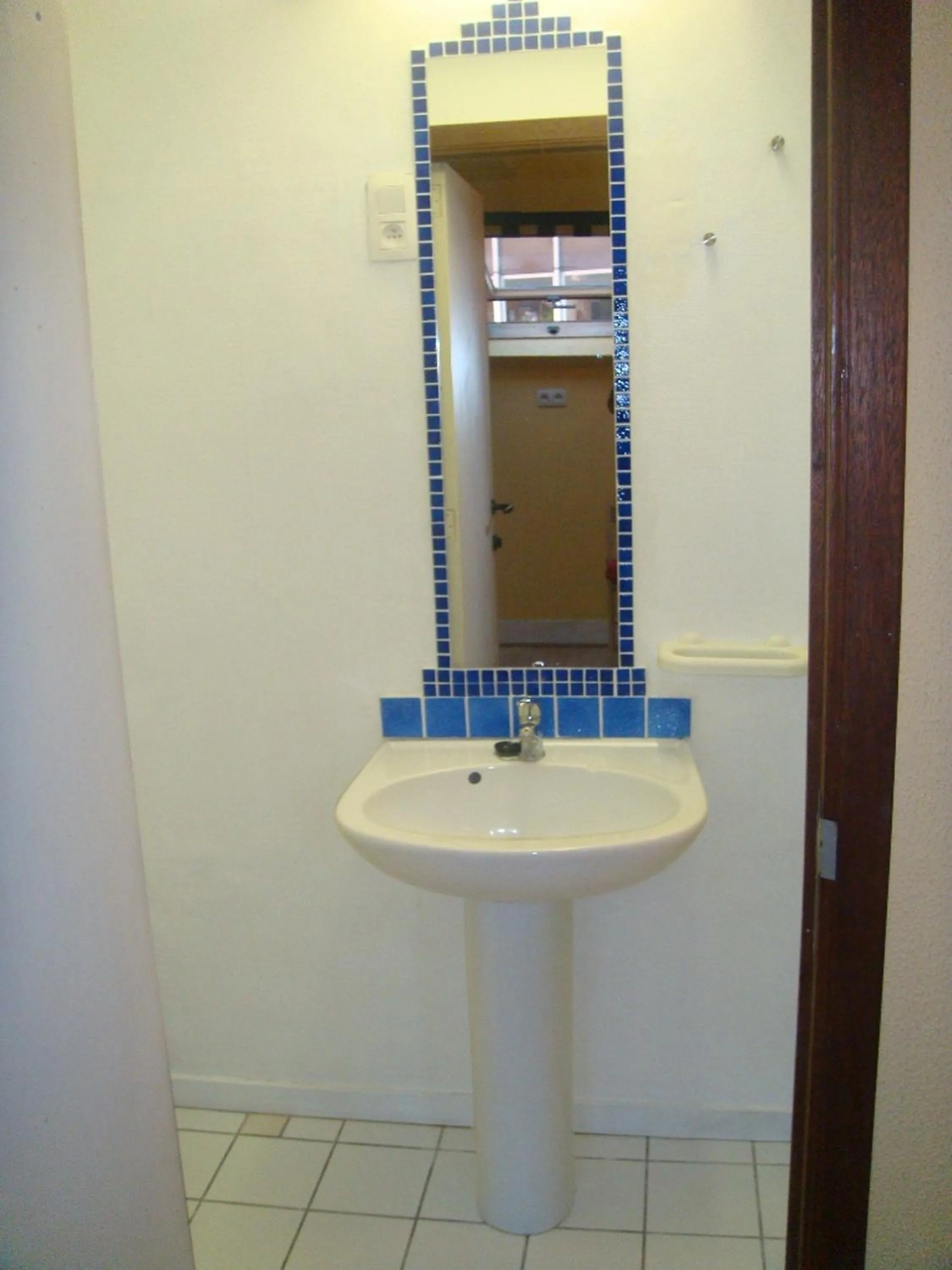 Bathroom in Appart-hôtel Maison de la Lune - petite Auberge d'Etterbeek
