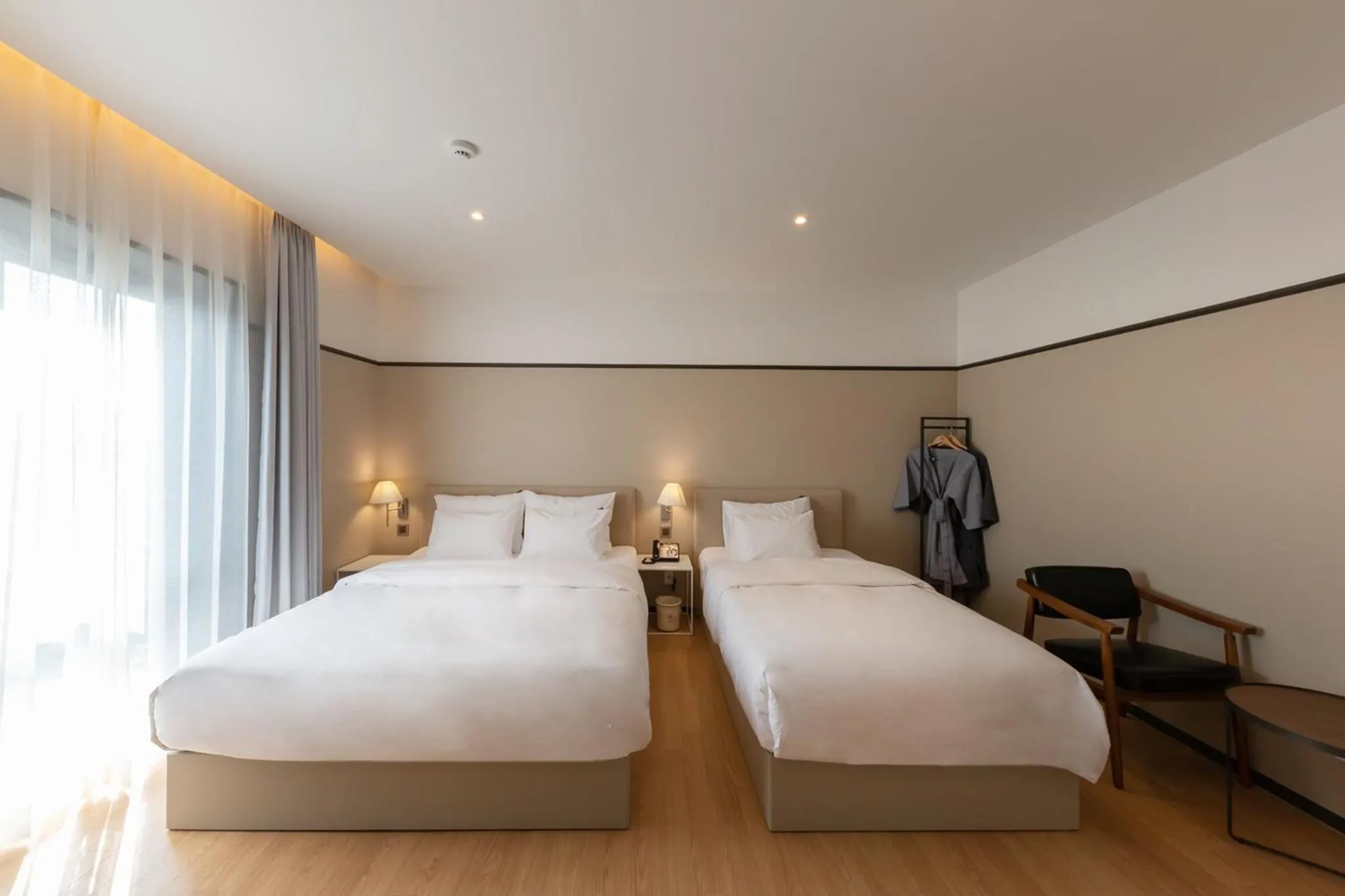 Bed in Brown-Dot Hotel Dongchon Amusement Park