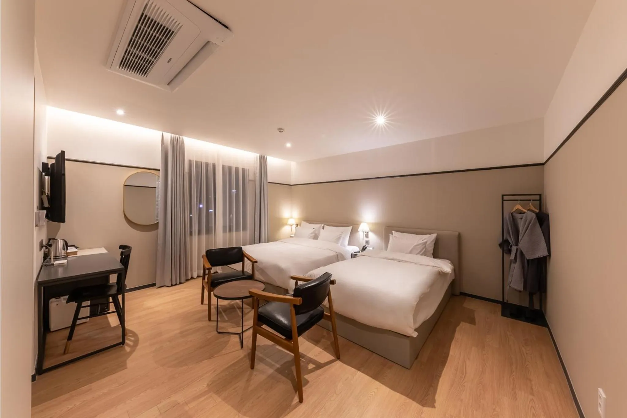 Bed in Brown-Dot Hotel Dongchon Amusement Park