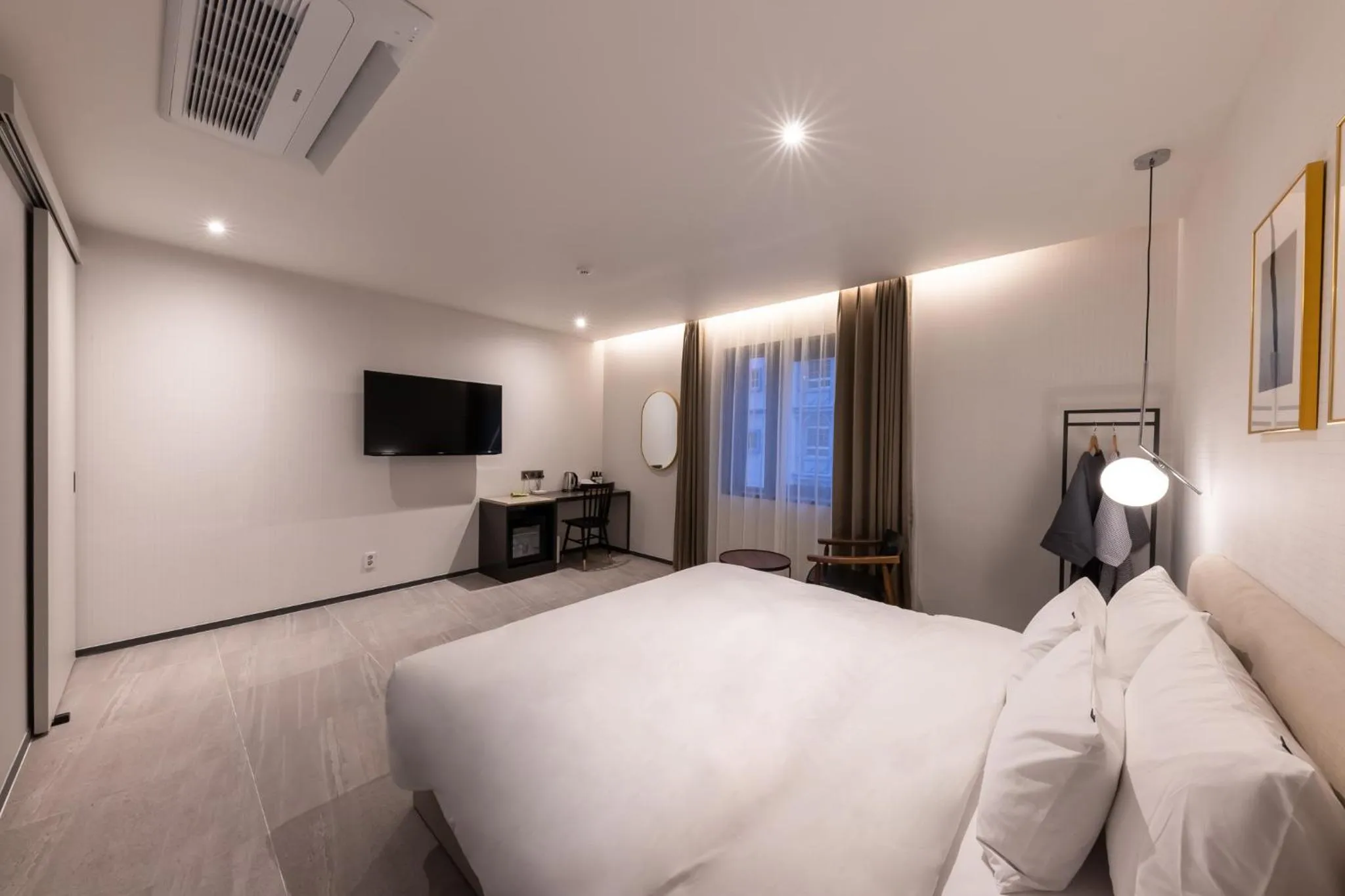 Bed in Brown-Dot Hotel Dongchon Amusement Park