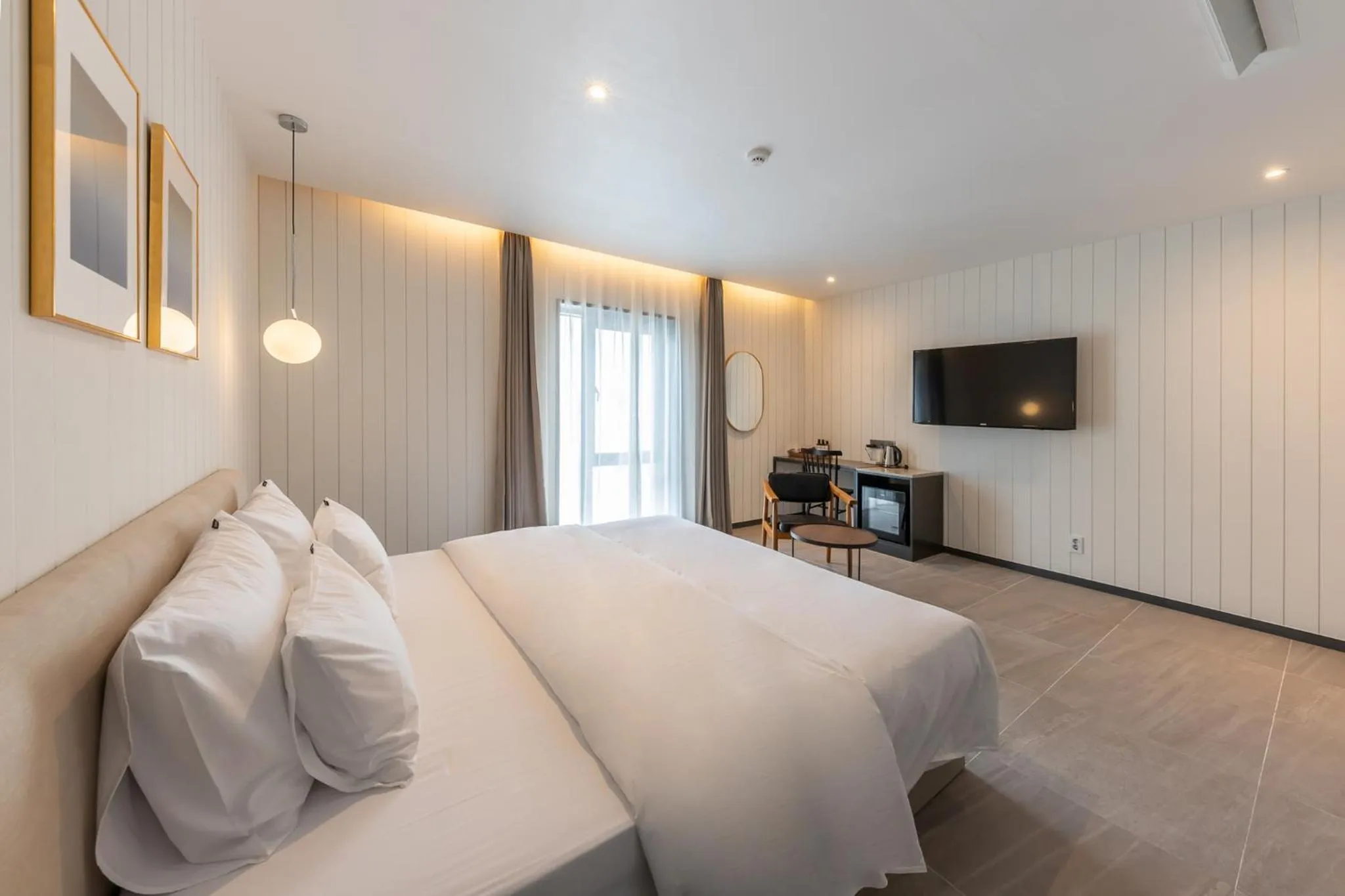 Bed in Brown-Dot Hotel Dongchon Amusement Park