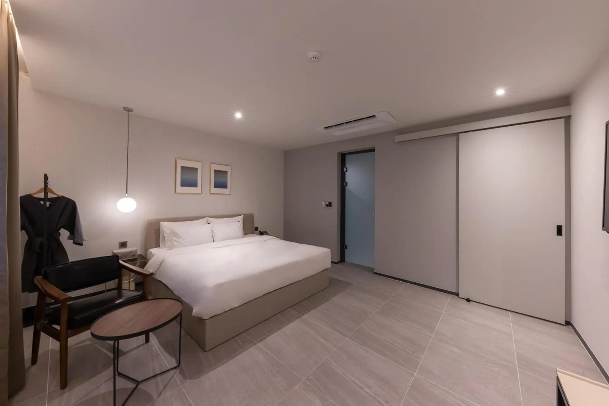 Bed in Brown-Dot Hotel Dongchon Amusement Park