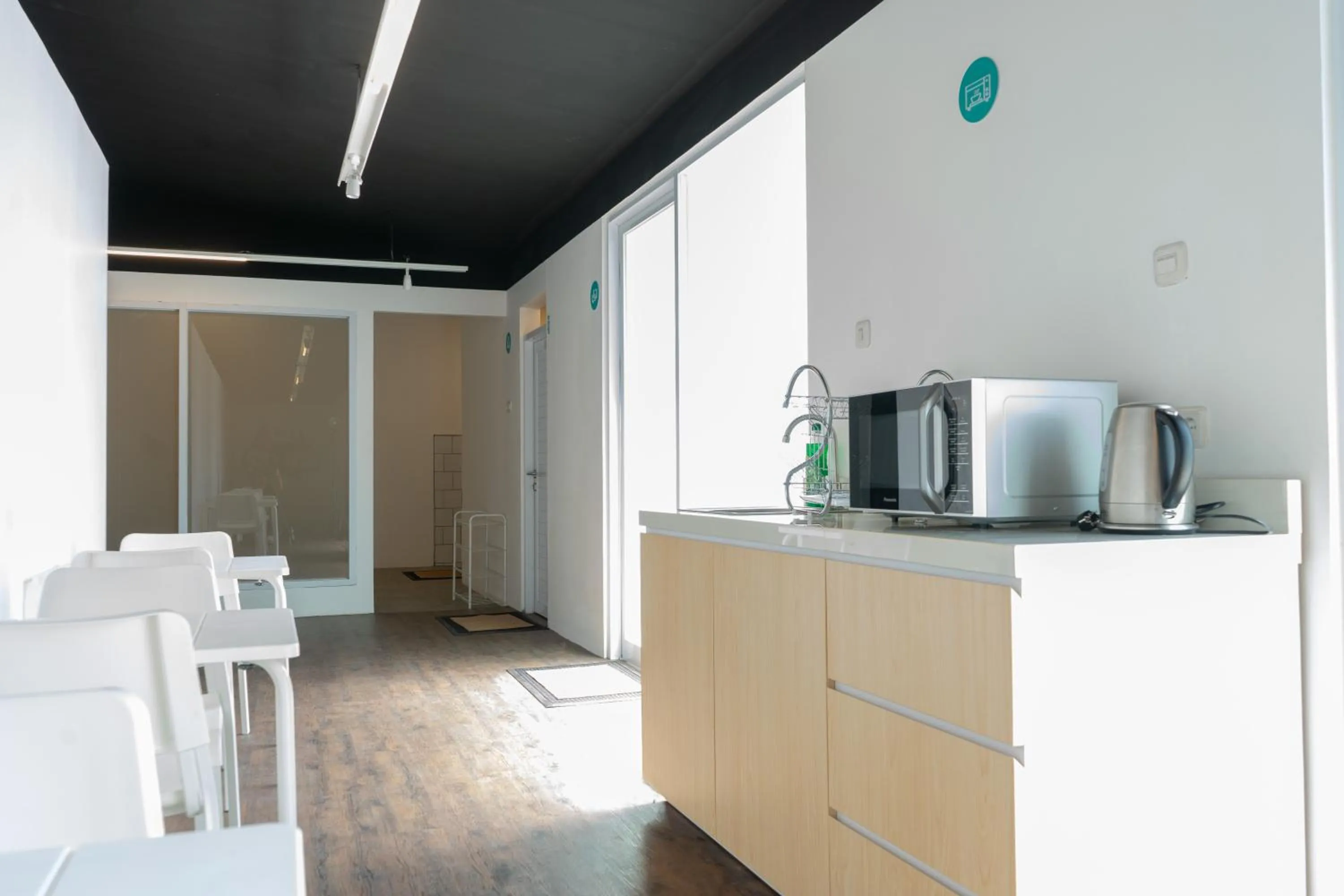 Communal kitchen in Bobopod Dago, Bandung