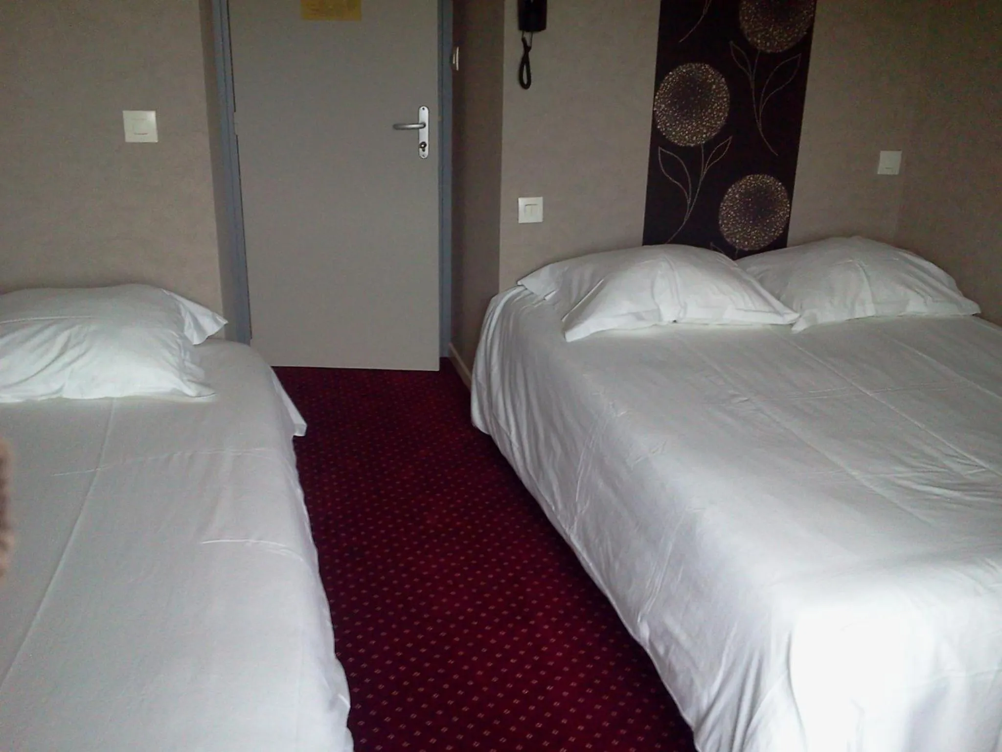 Bed in Hotel Restaurant Le Phare