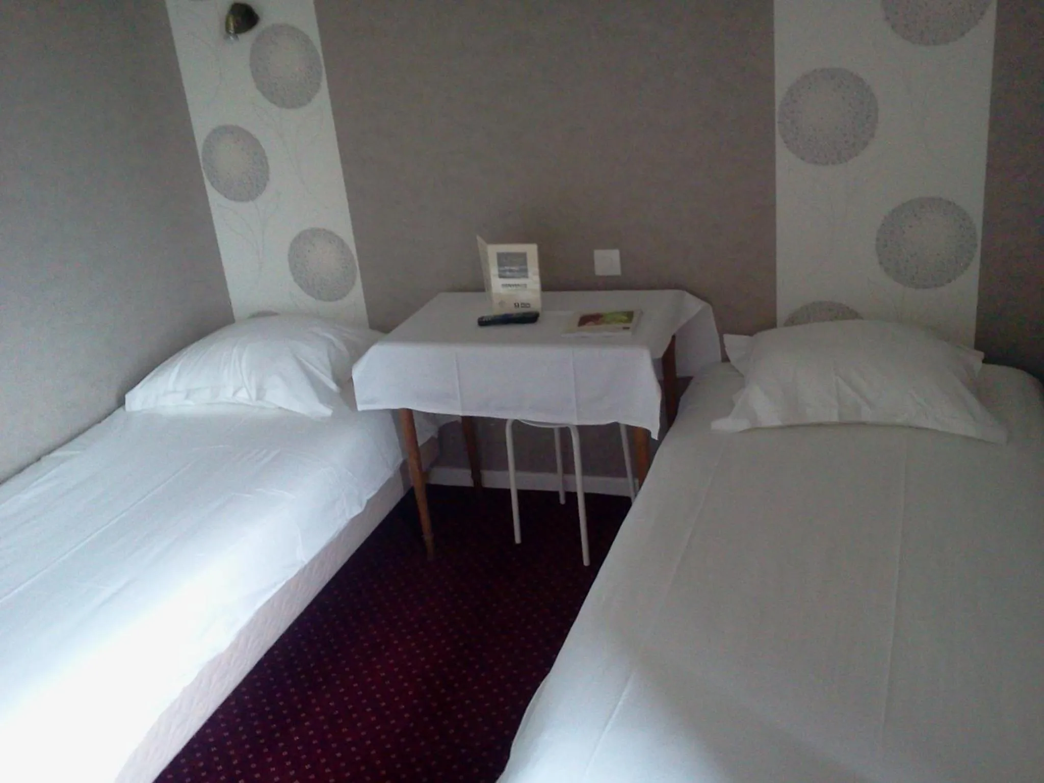 Bed in Hotel Restaurant Le Phare