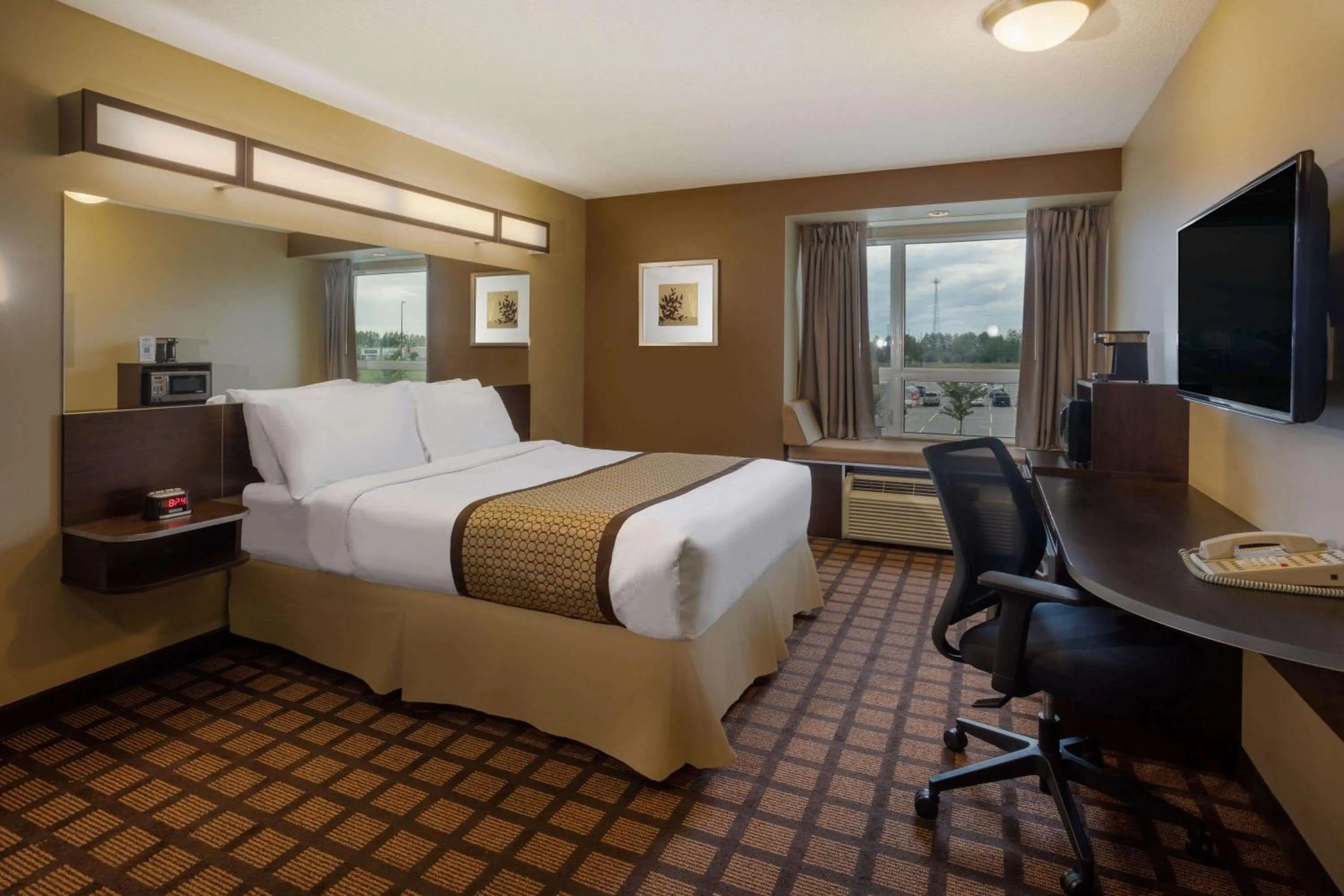 Photo of the whole room, Bed in Microtel Inn & Suites by Wyndham - Timmins