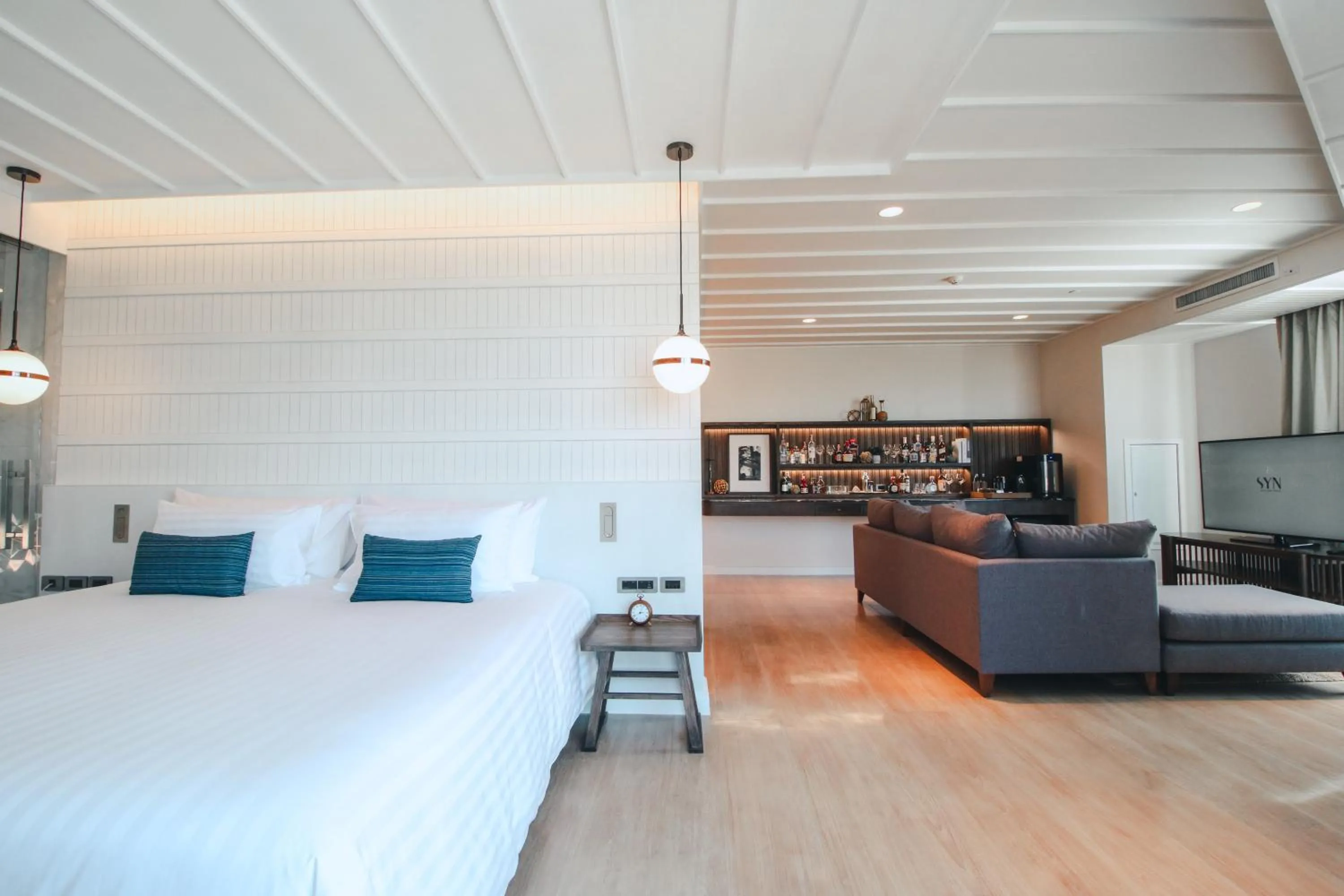 Bed in SYN Boutique Hotel