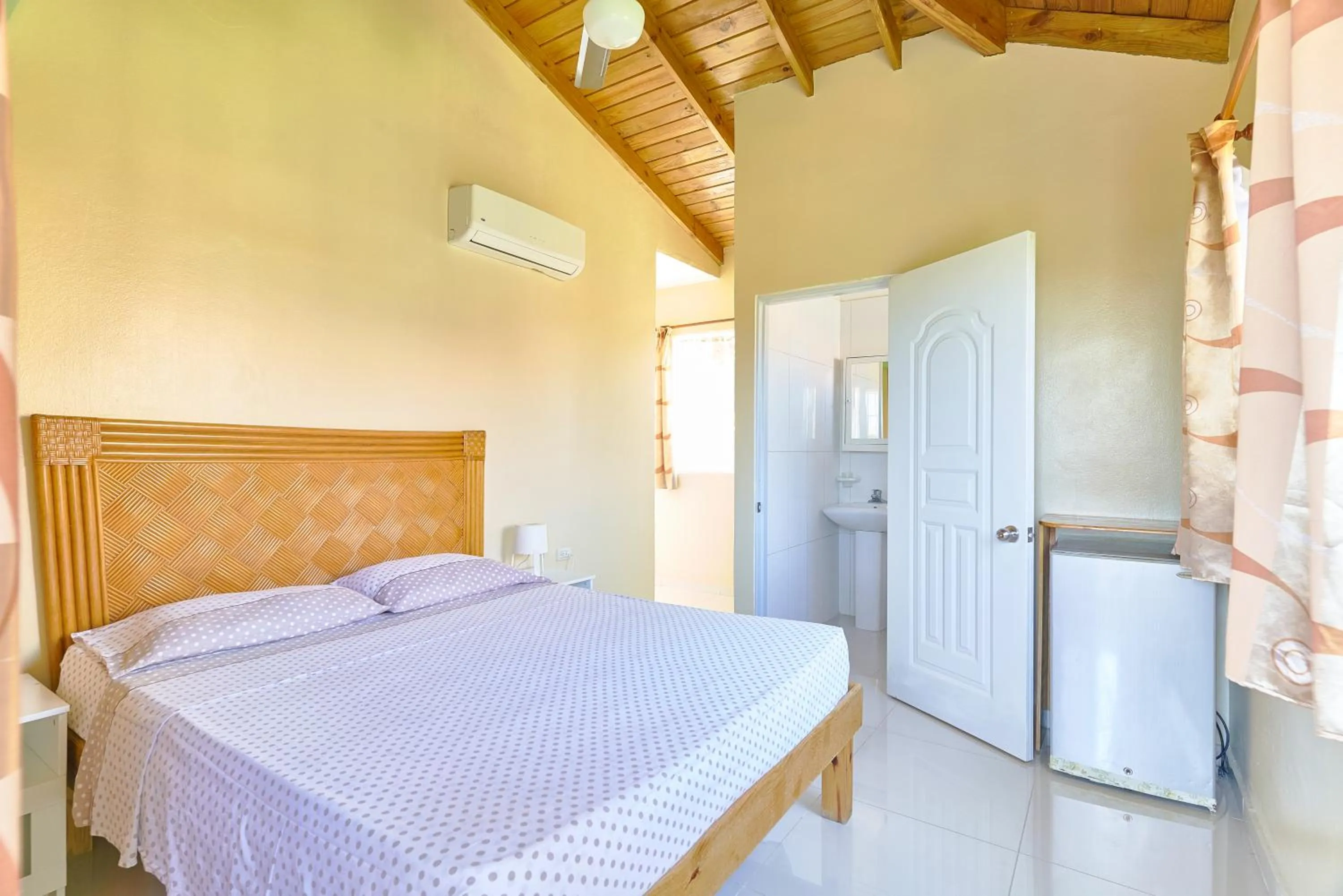 Photo of the whole room, Bed in Parco del Caribe