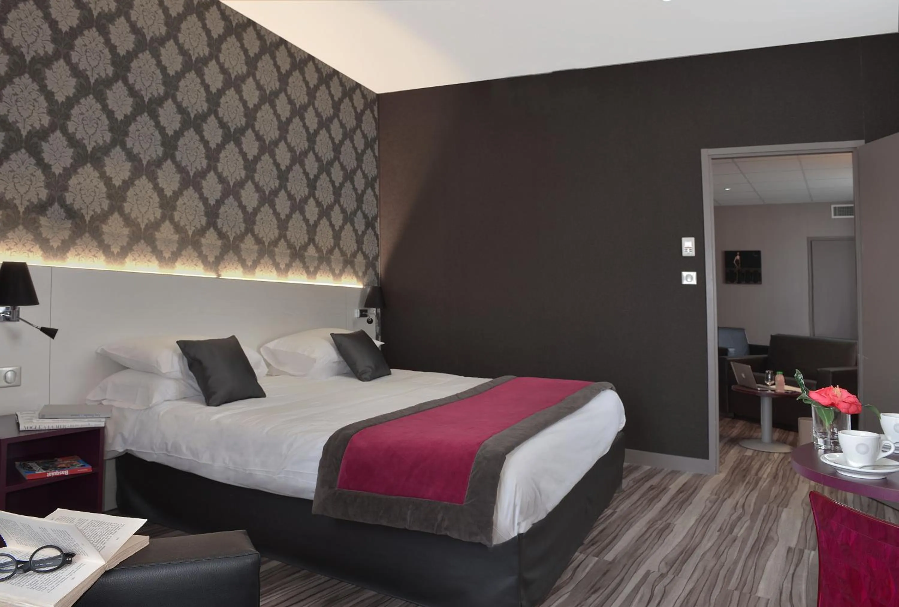 Photo of the whole room, Bed in Logis Hôtel-Restaurant LE FONTARABIE