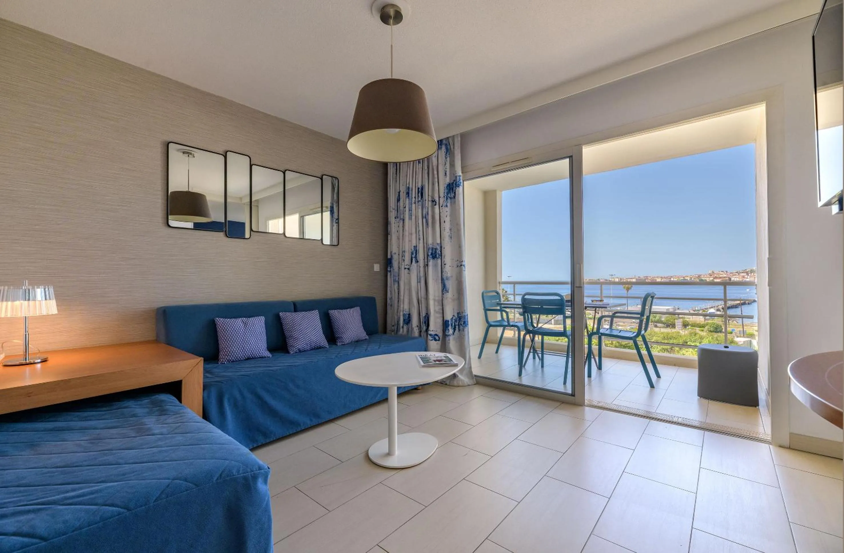 Living room, Bed in Best Western Plus Ajaccio Amirauté