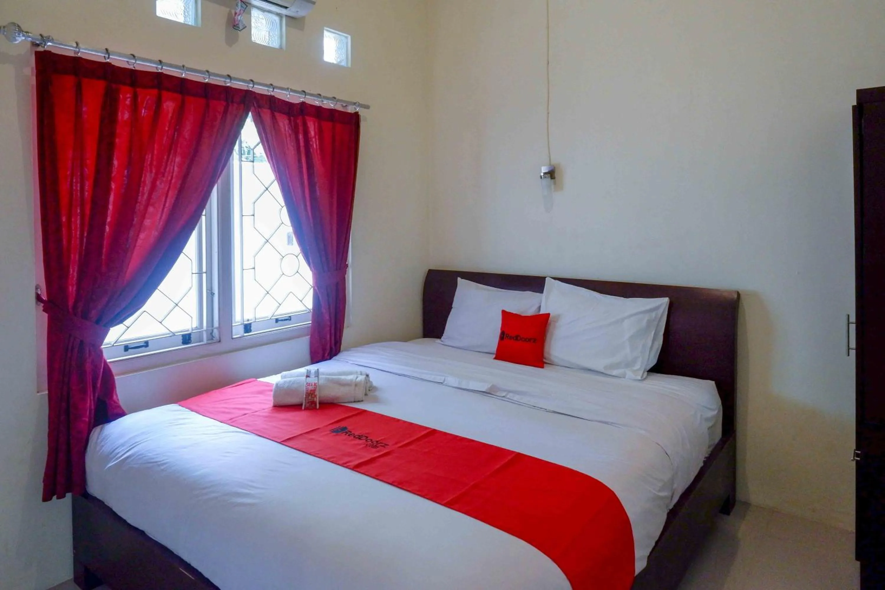 Bed in RedDoorz near Institut Pertanian Yogyakarta