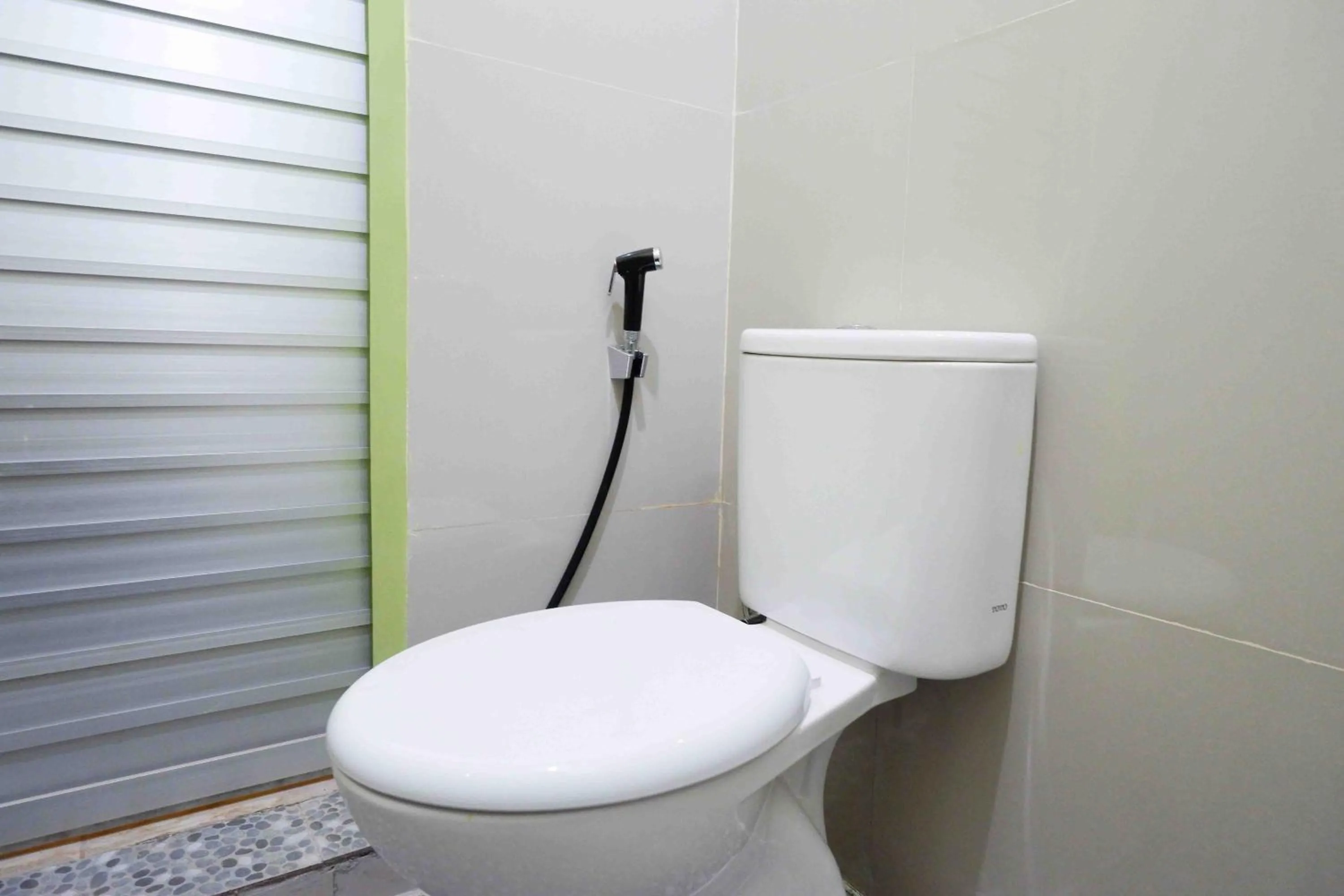 Bathroom in RedDoorz near Institut Pertanian Yogyakarta