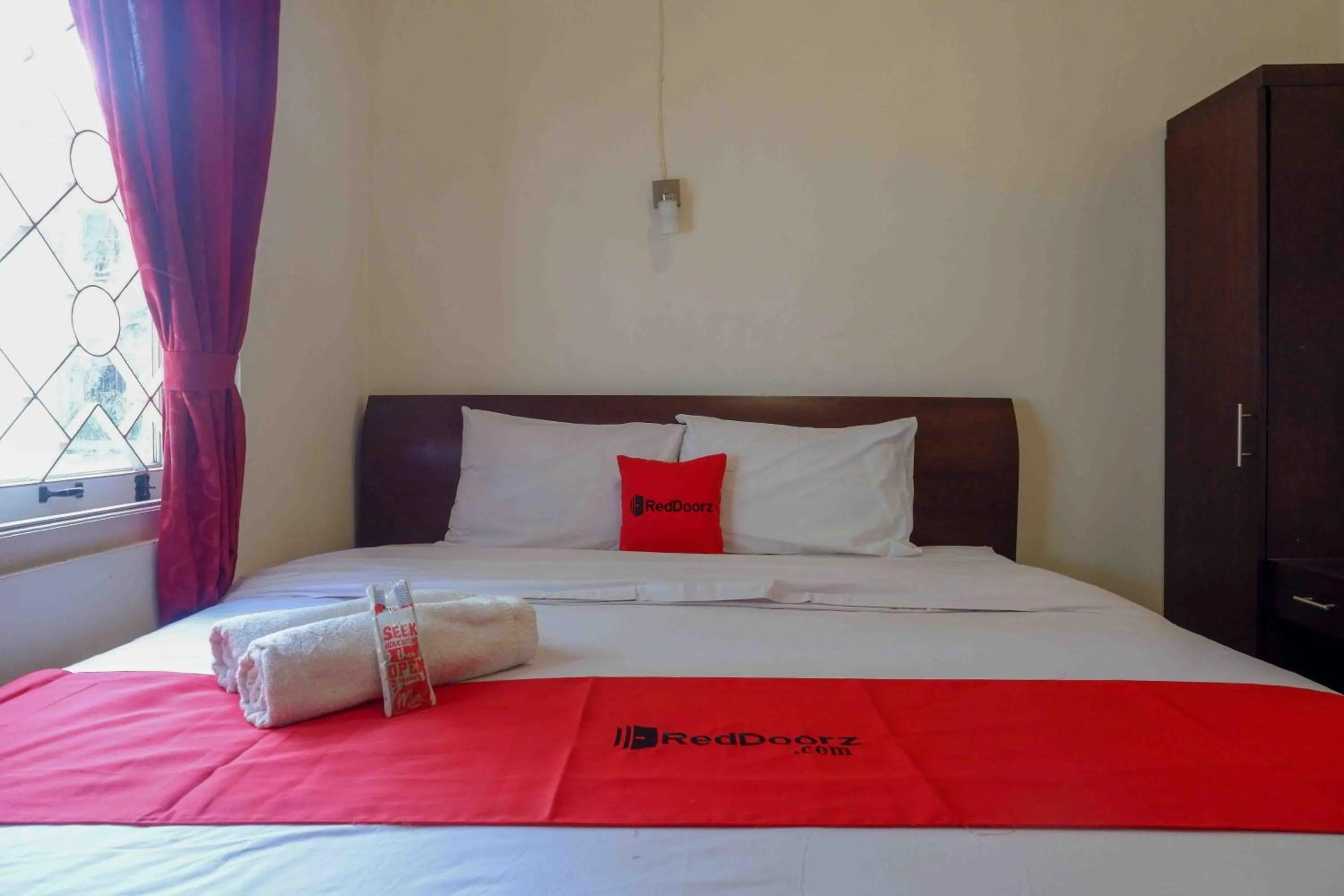 Bed in RedDoorz near Institut Pertanian Yogyakarta