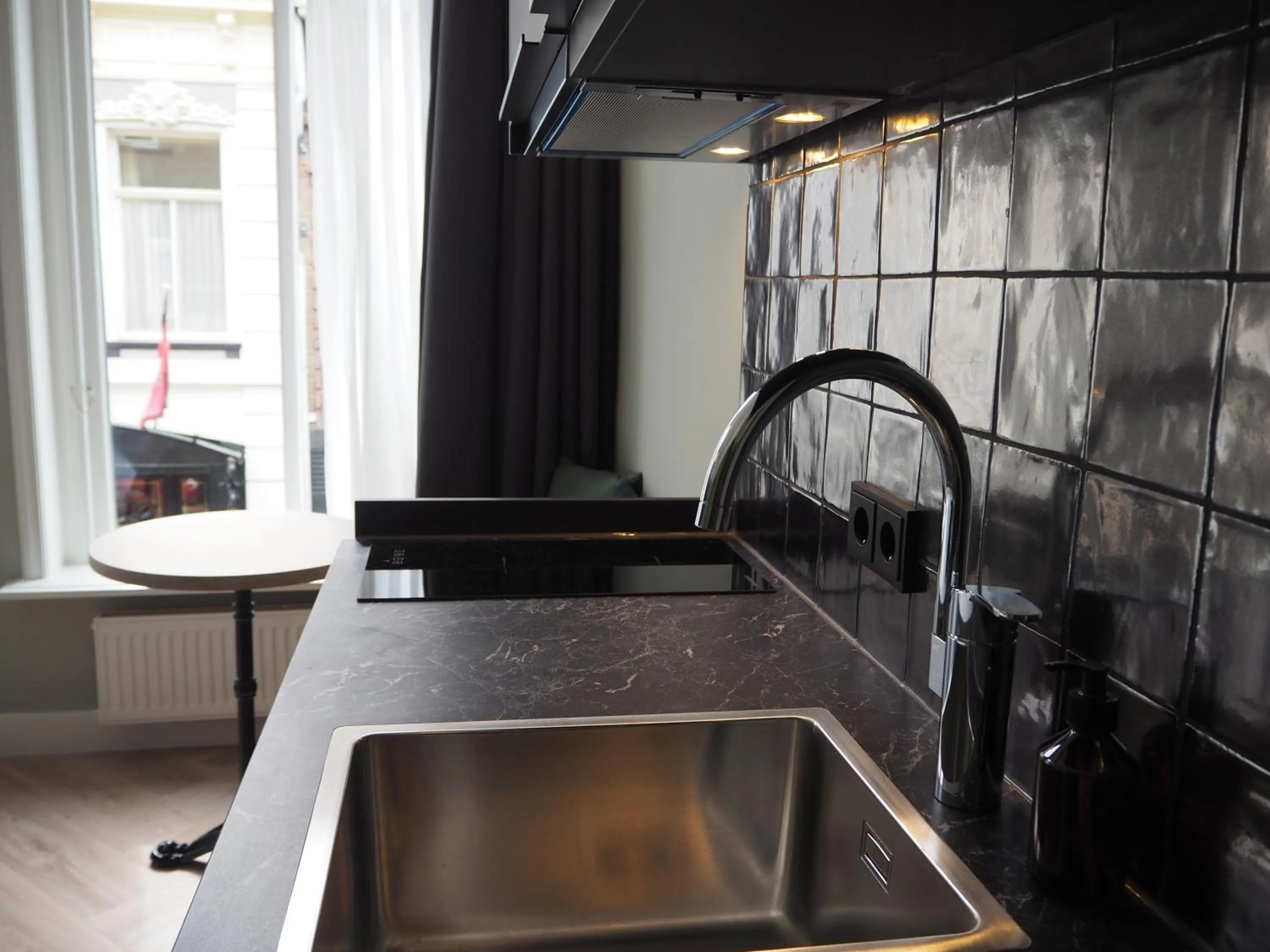 Kitchen or kitchenette in Lino City Hotel