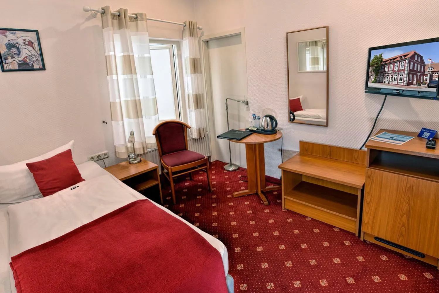 Photo of the whole room, Bed in Hotel Stadt Hamburg