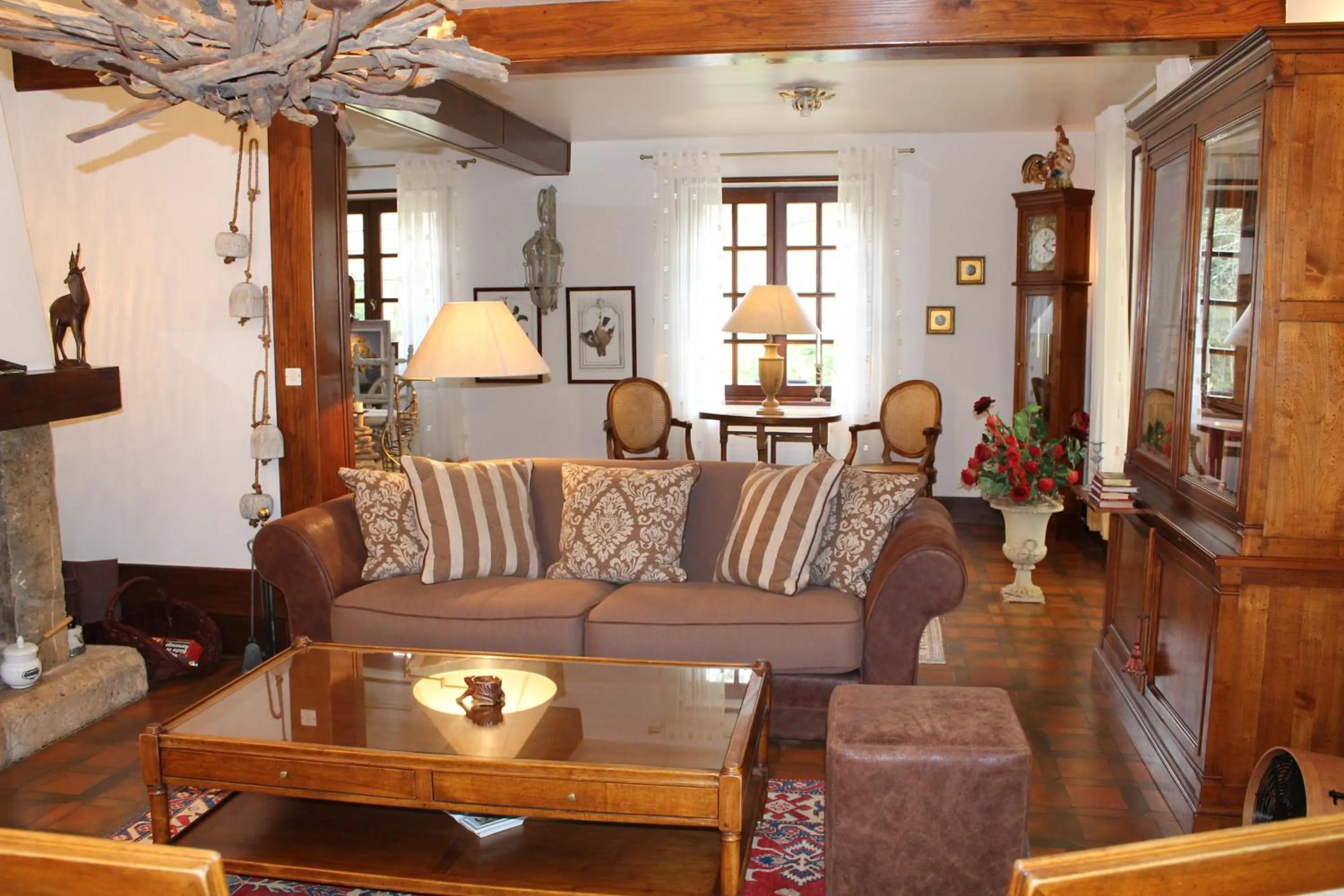 Communal lounge/ TV room in Chambres d'hôtes La Brillève