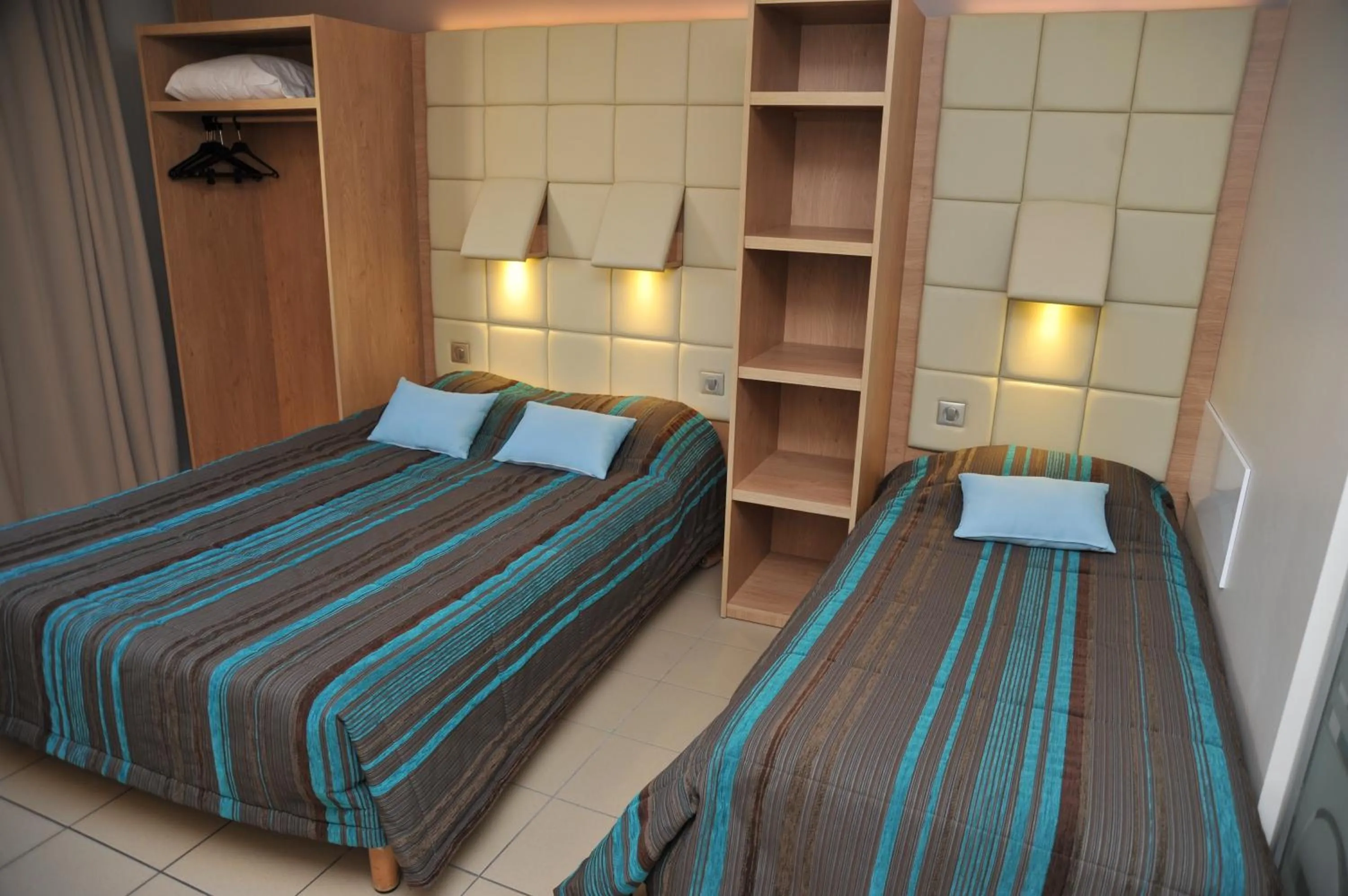 Bedroom, Bed in Hotel Espace Cite