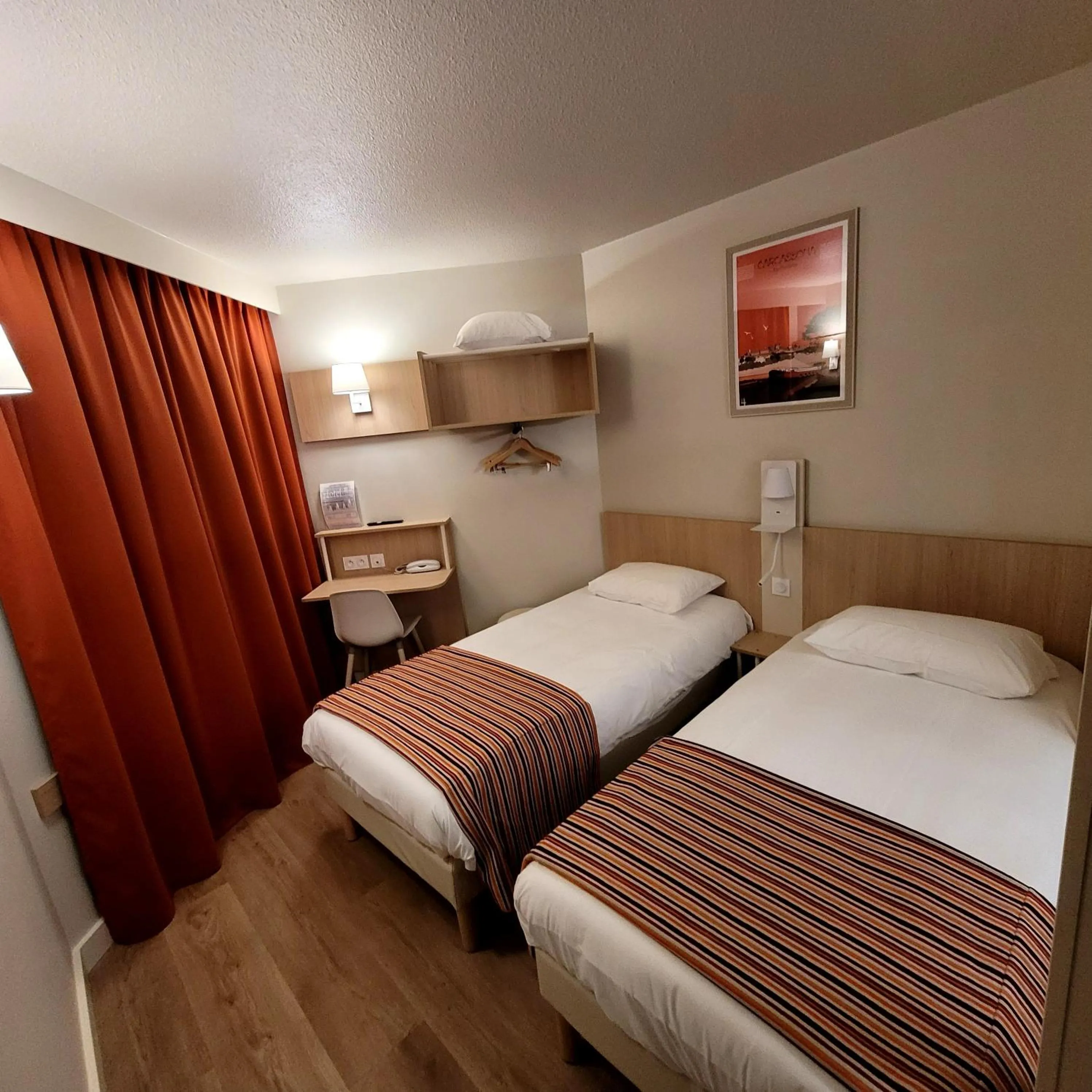 Bed in Hotel Espace Cite