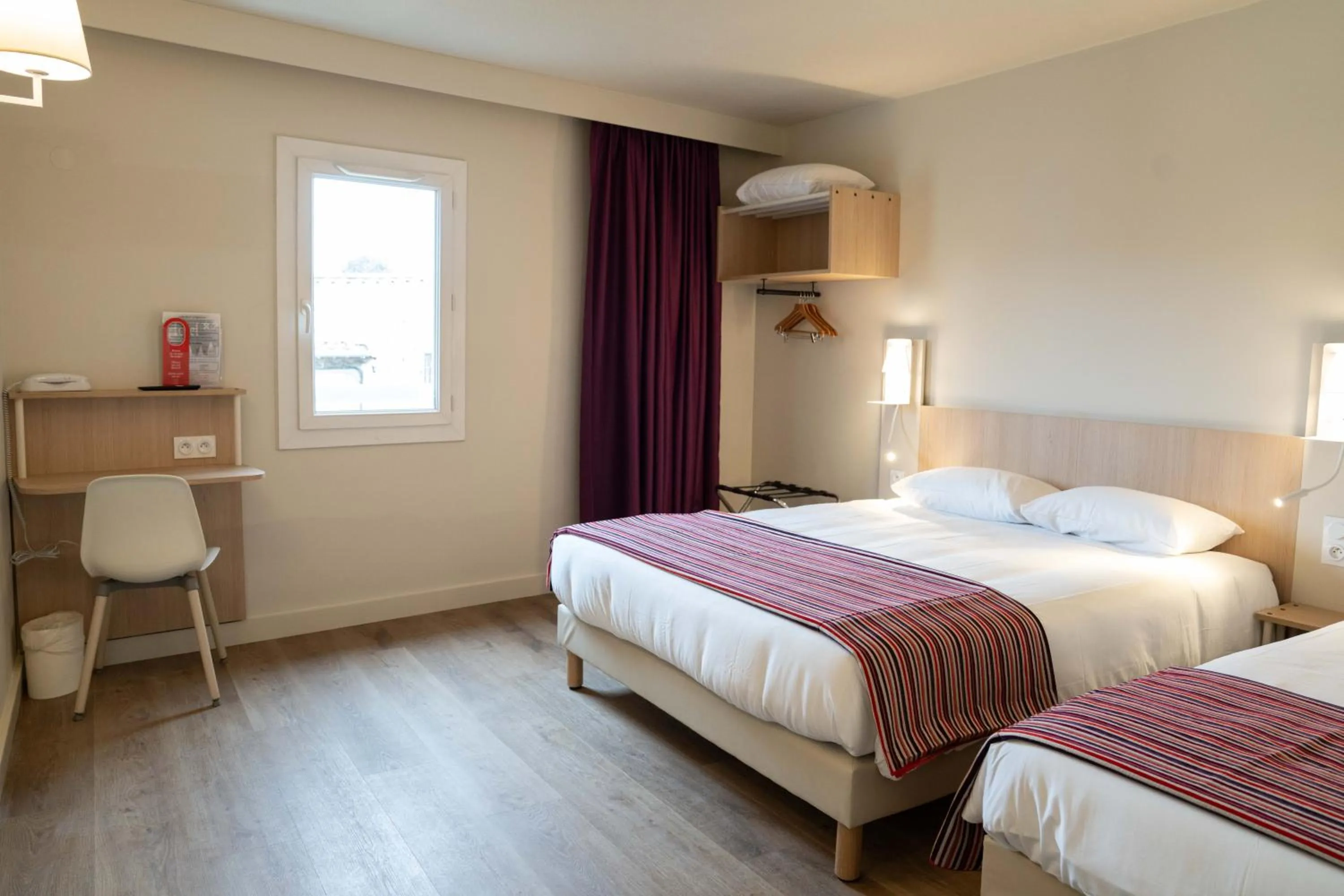 Bed in Hotel Espace Cite