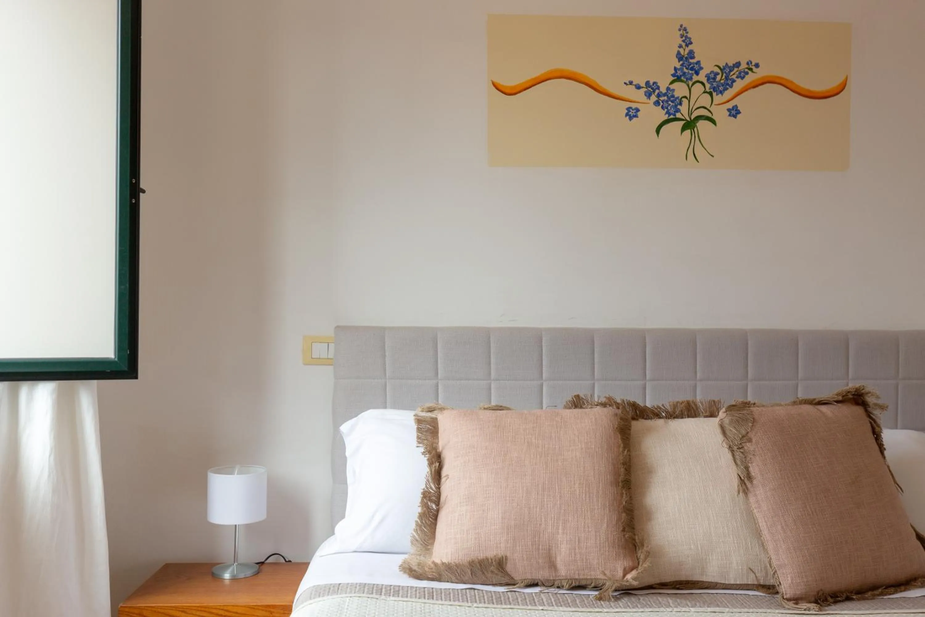 Bed in Flowers apartments & rooms