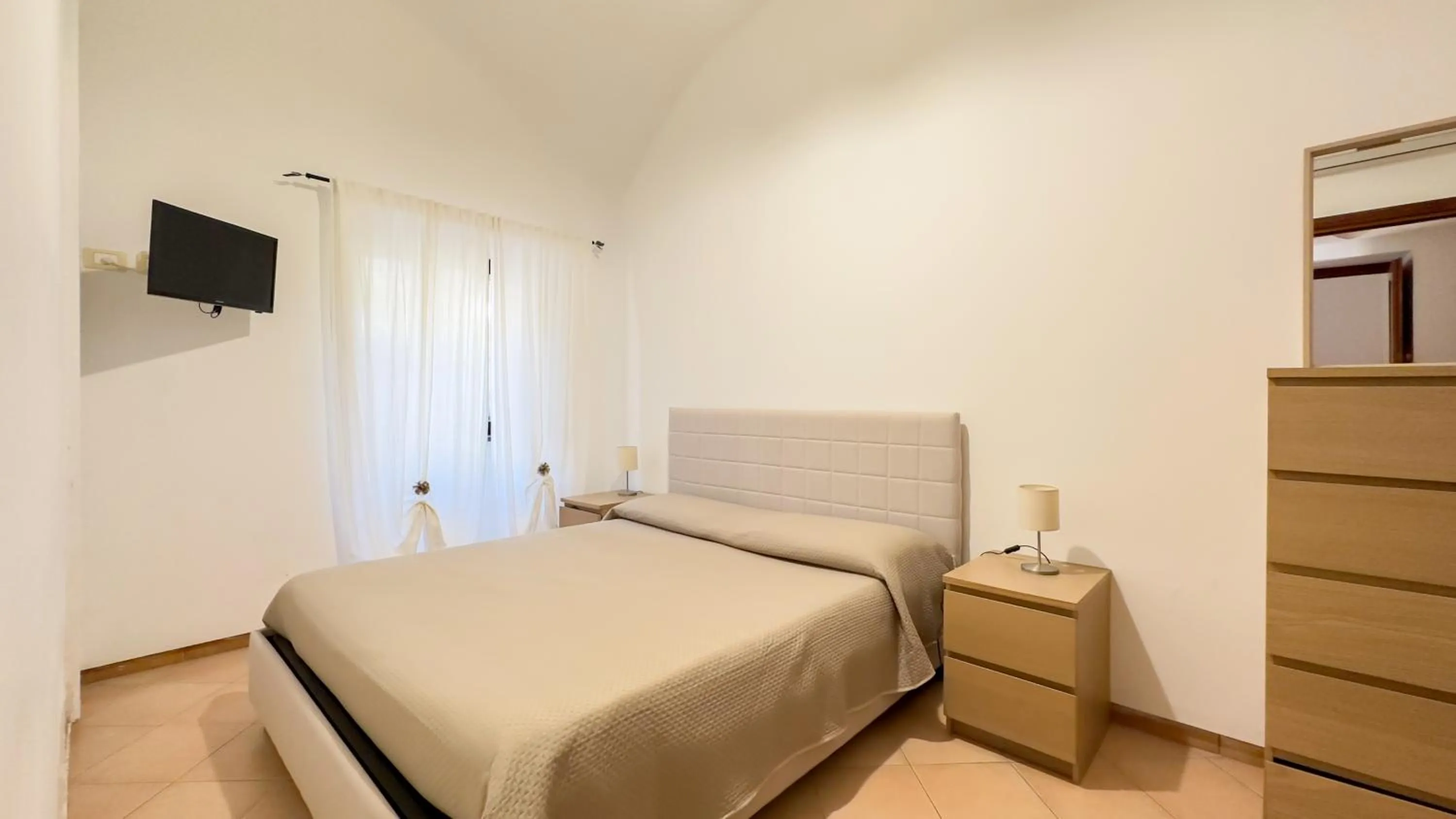 Bed in Flowers apartments & rooms