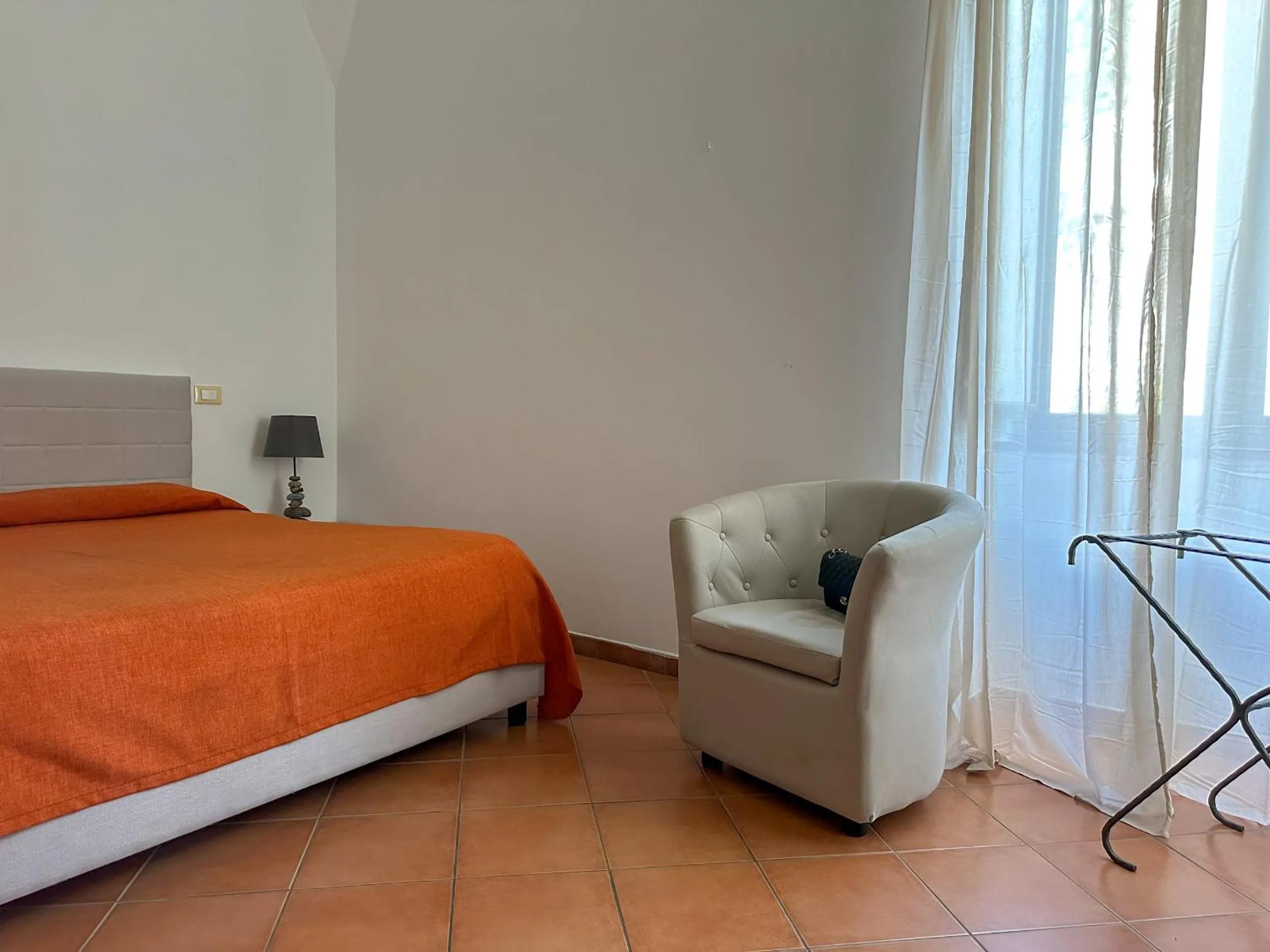 Bed in Flowers apartments & rooms