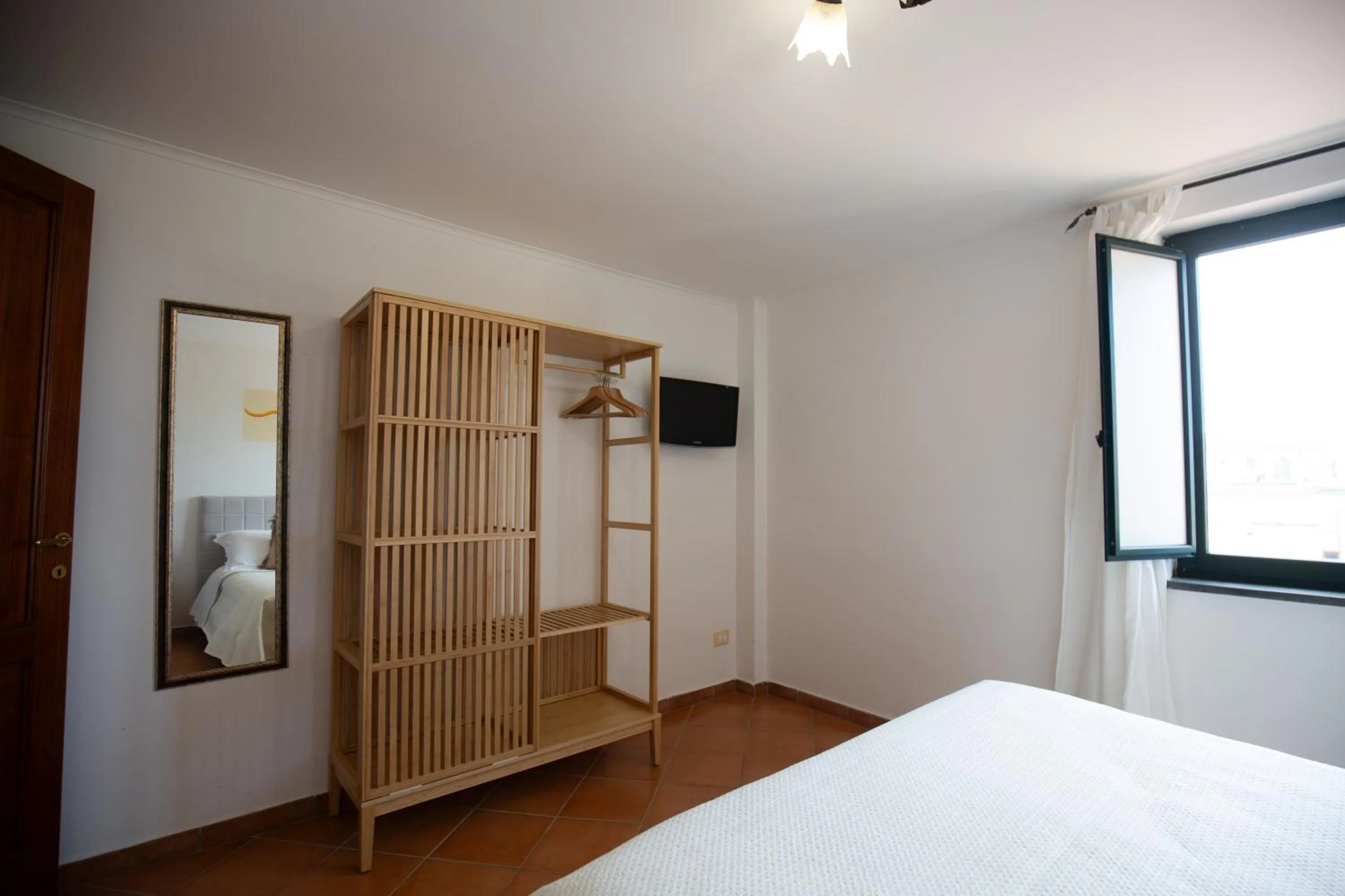 Bed in Flowers apartments & rooms