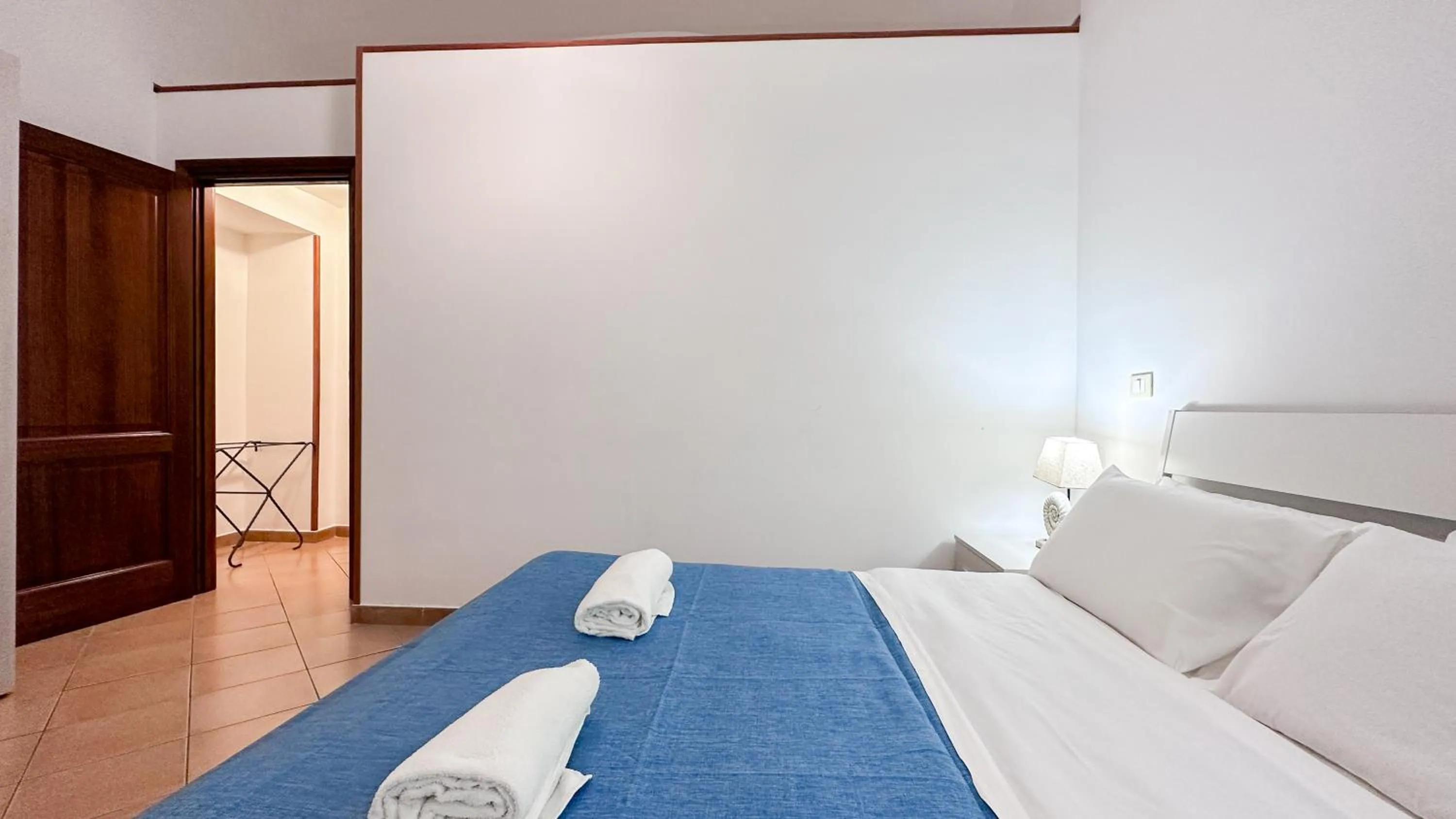 Bed in Flowers apartments & rooms