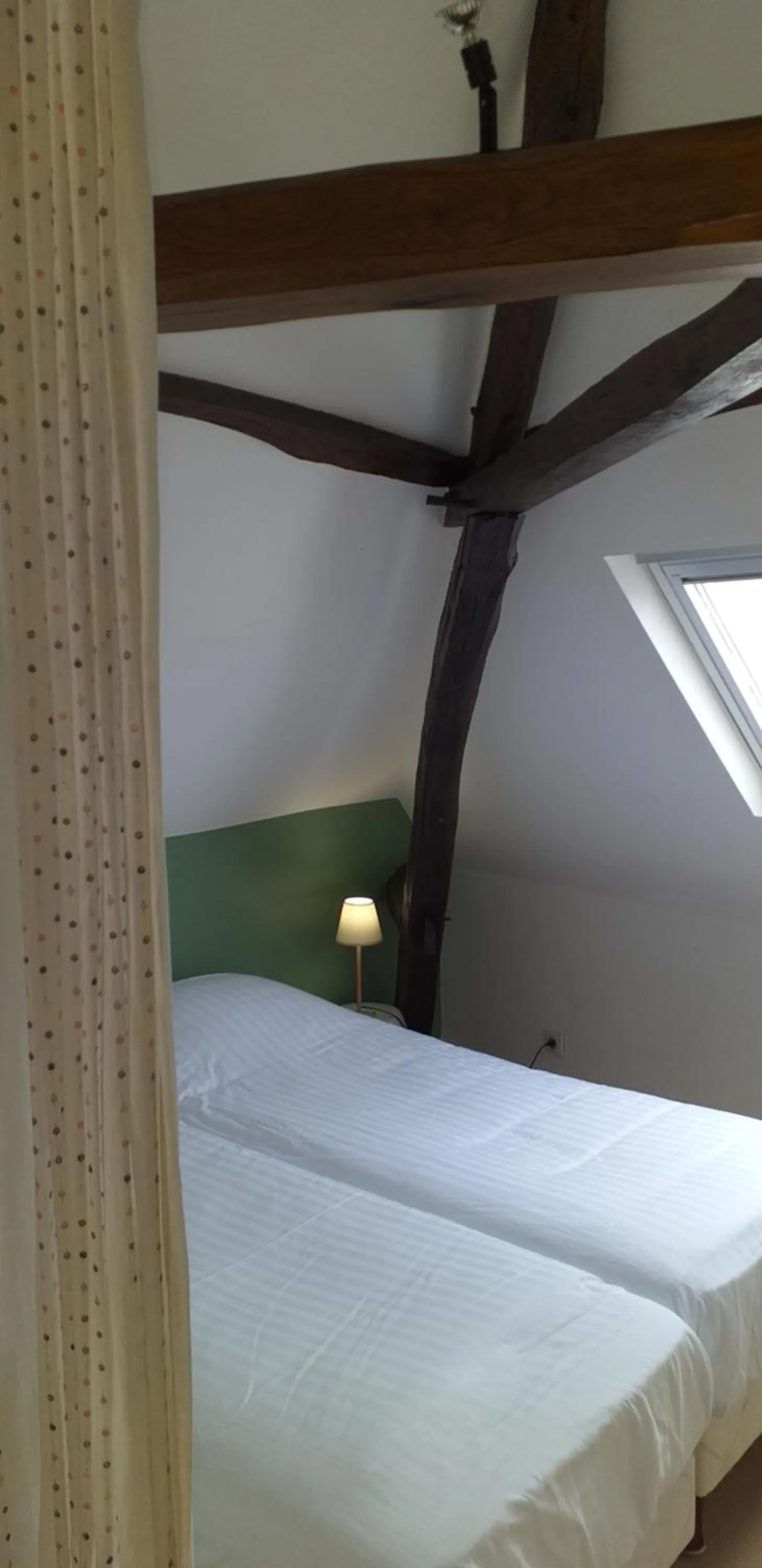 Bed in Logis Auberge Du Centre