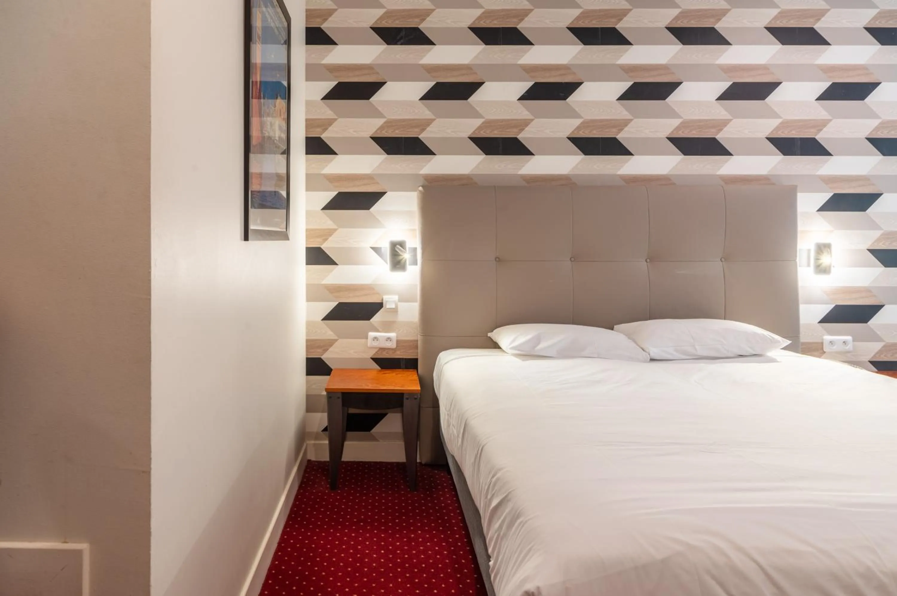 Bed in Logis Le Relais de Fusies