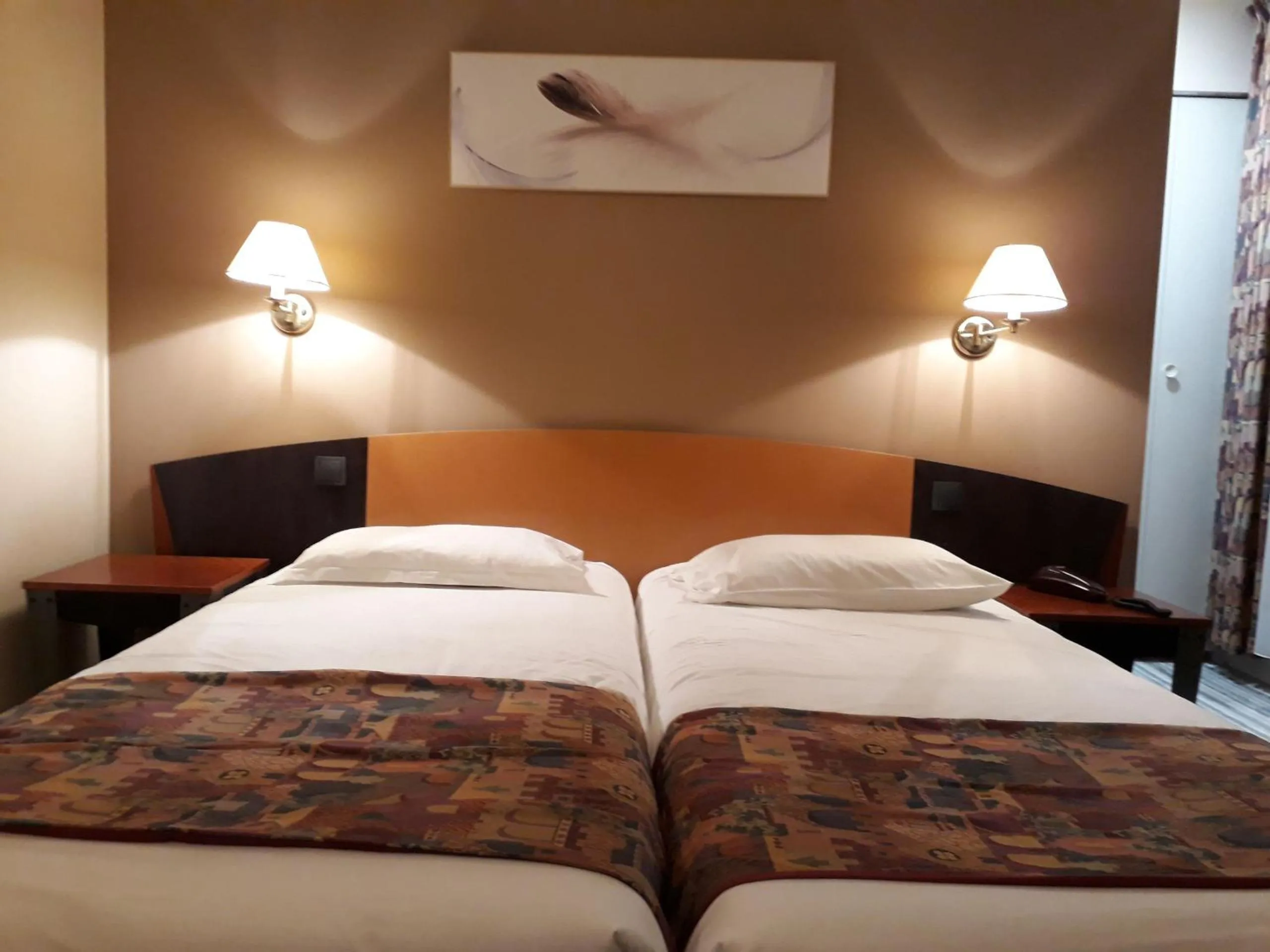 Bed in Logis Le Relais de Fusies