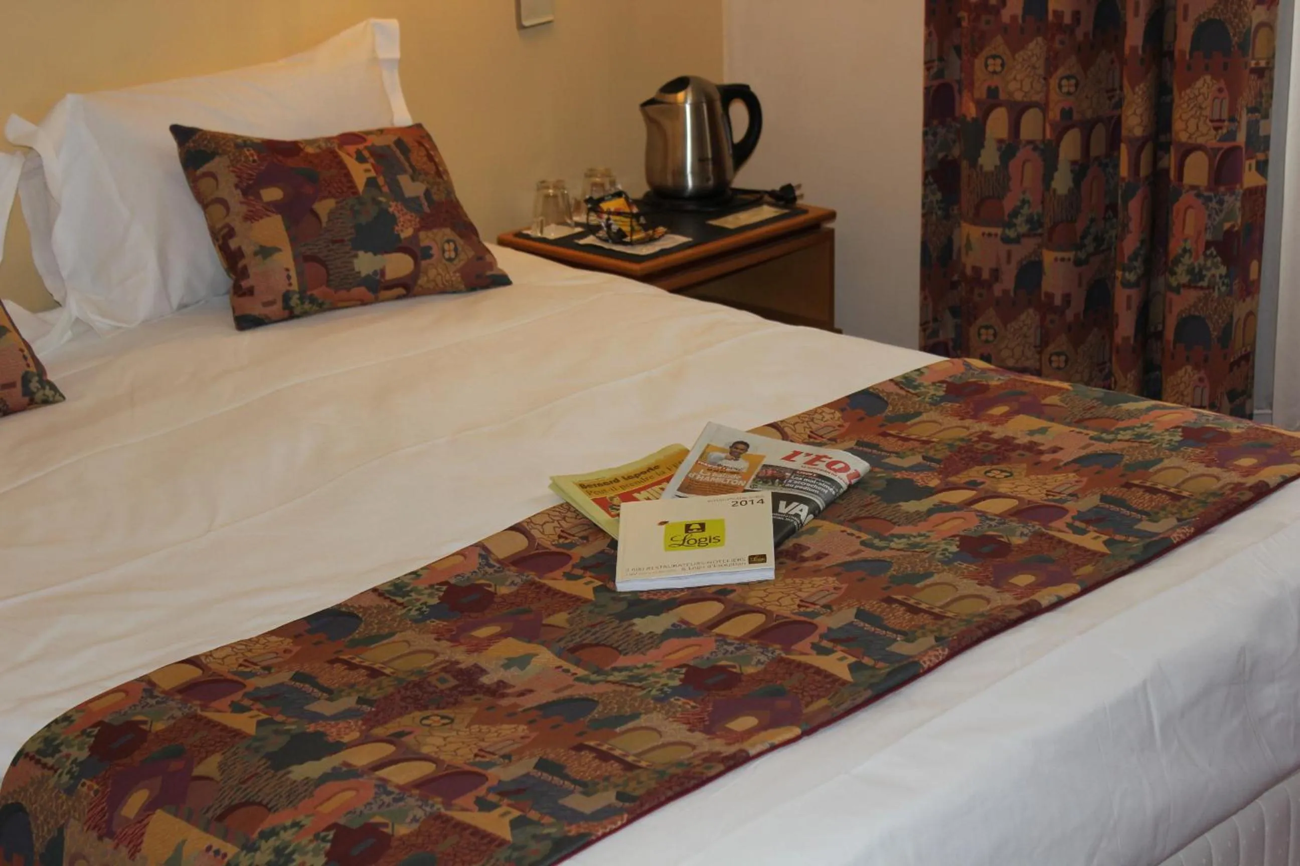 Bed in Logis Le Relais de Fusies