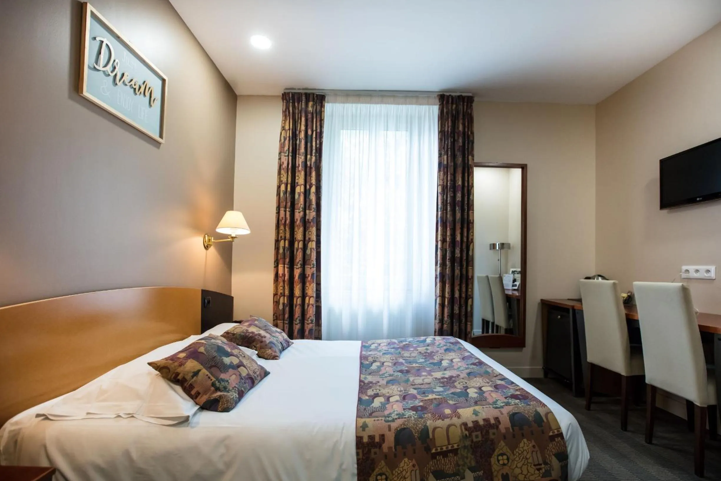 Bed in Logis Le Relais de Fusies